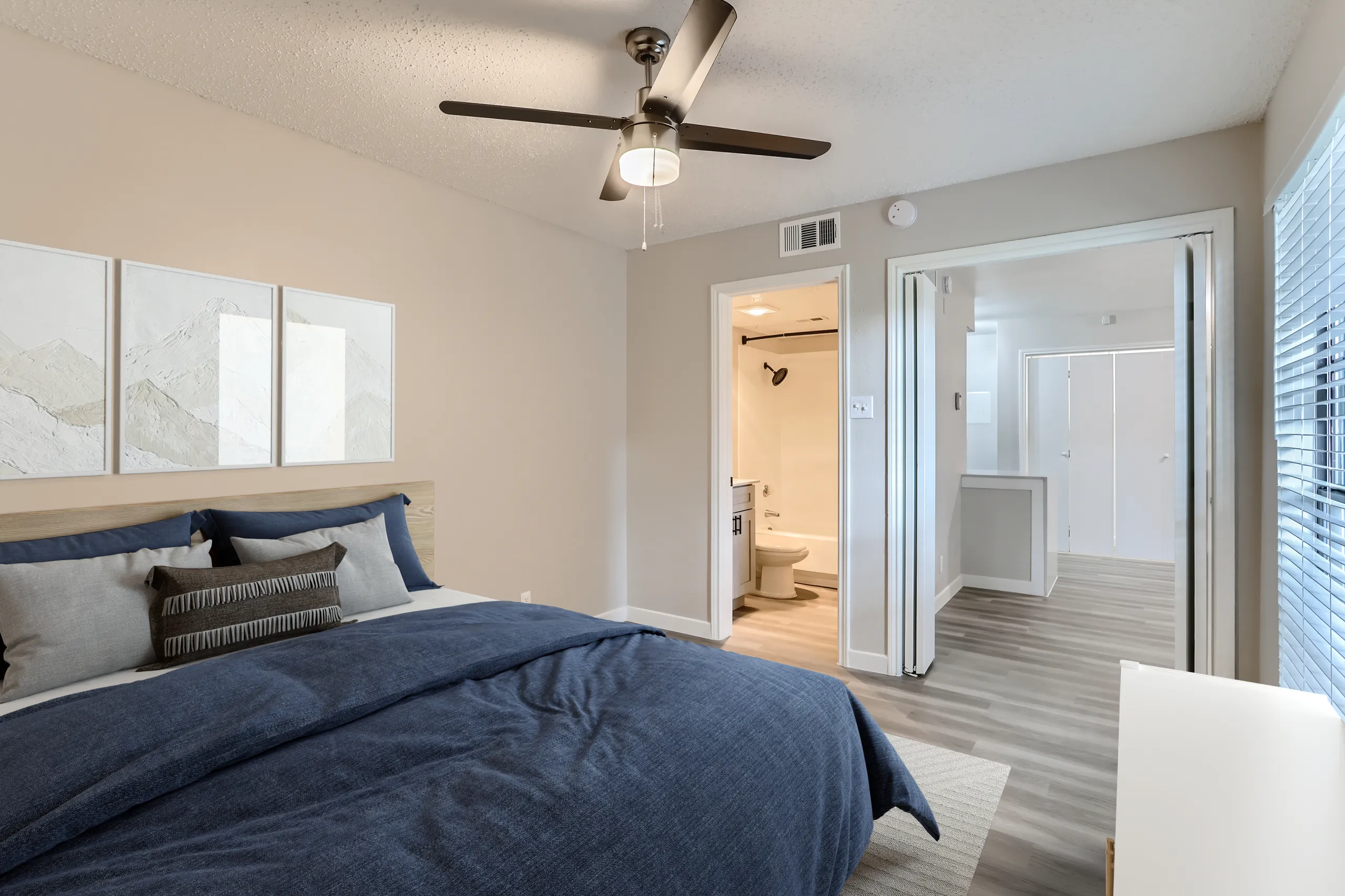 Primary bedroom with en-suite bathroom and walk-in closet access