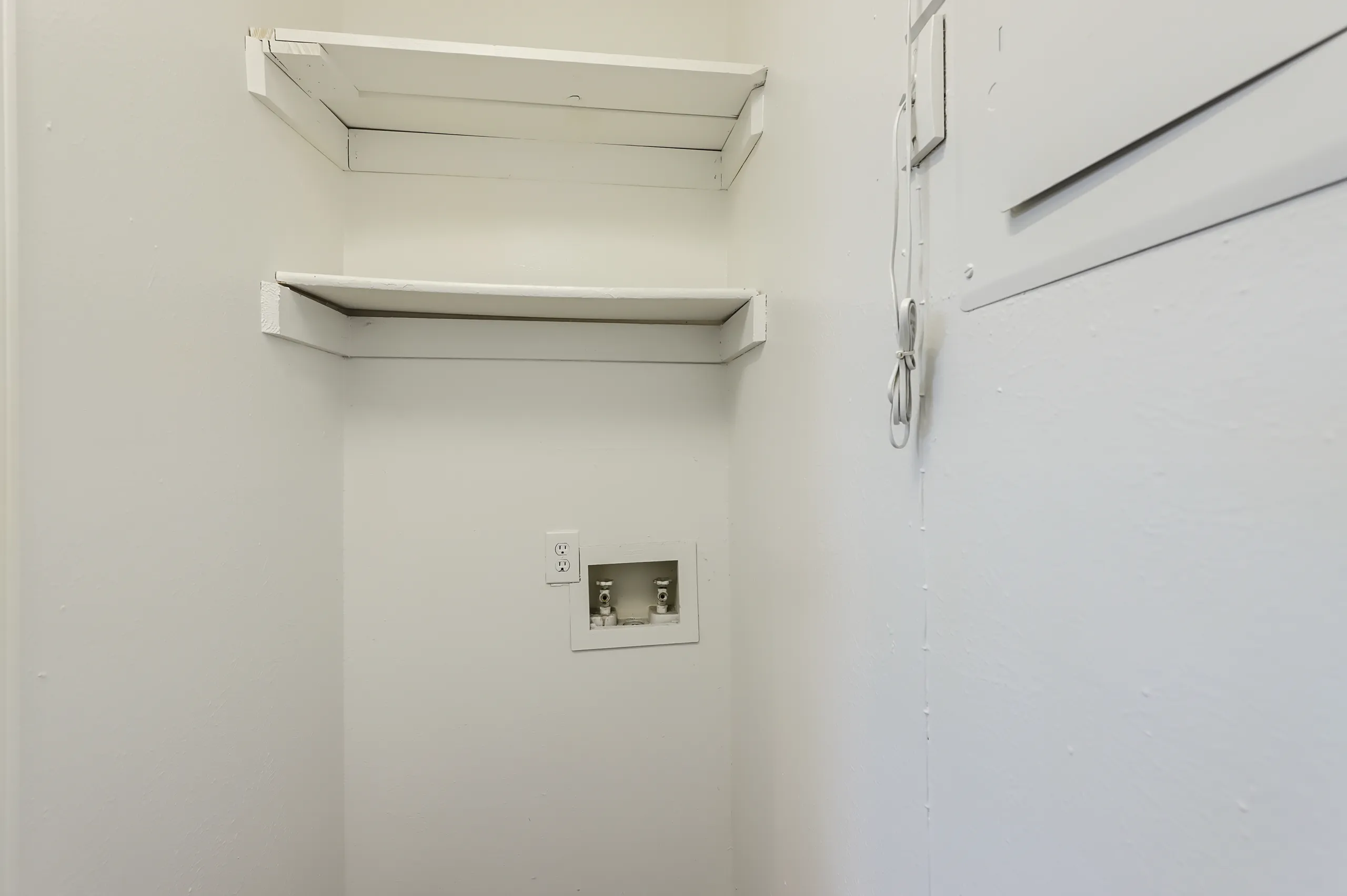 Laundry closet with washer-dryer hookups
