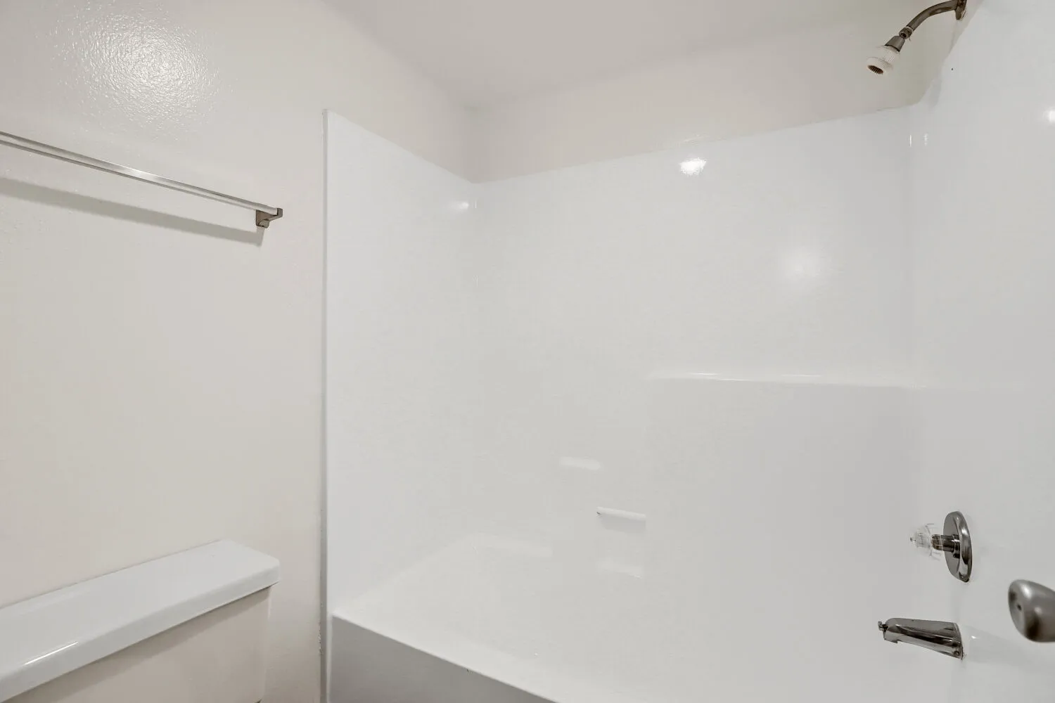 Bathroom with tub and shower combo