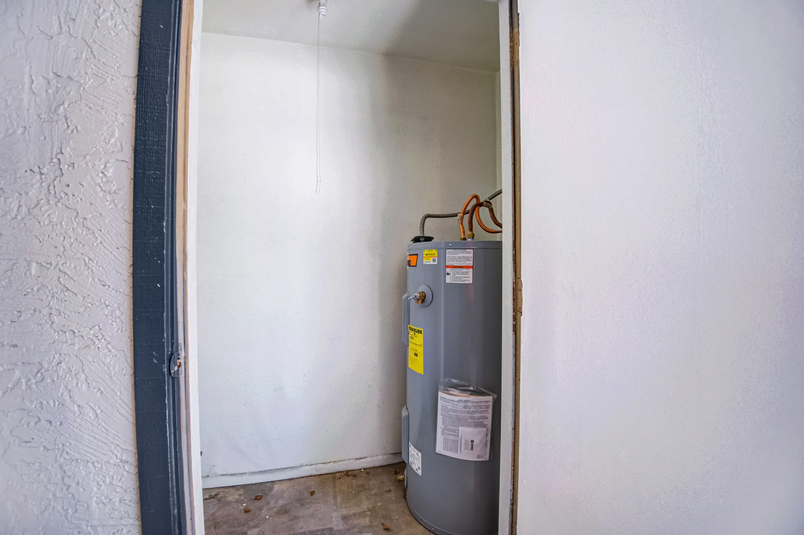 Private water heater closet on the patio