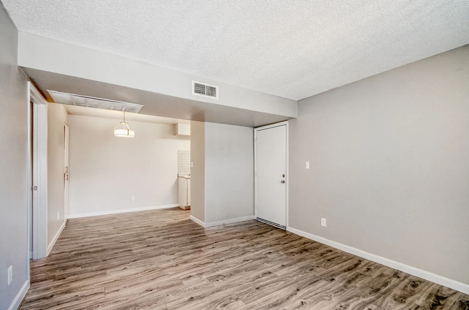 A1 Silver floor plan living room with view into kitchen and entry door