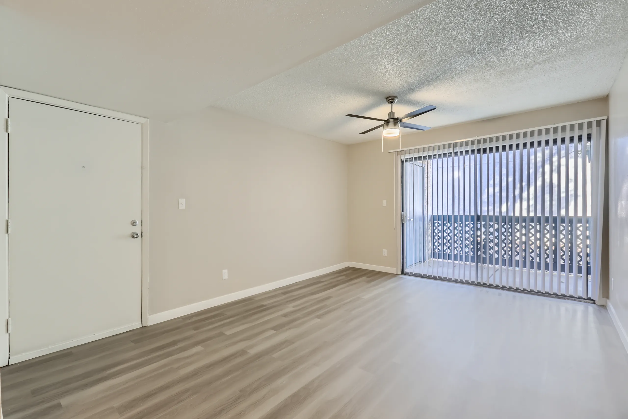 A1 Platinum floor plan living room with ceiling fan and private balcony