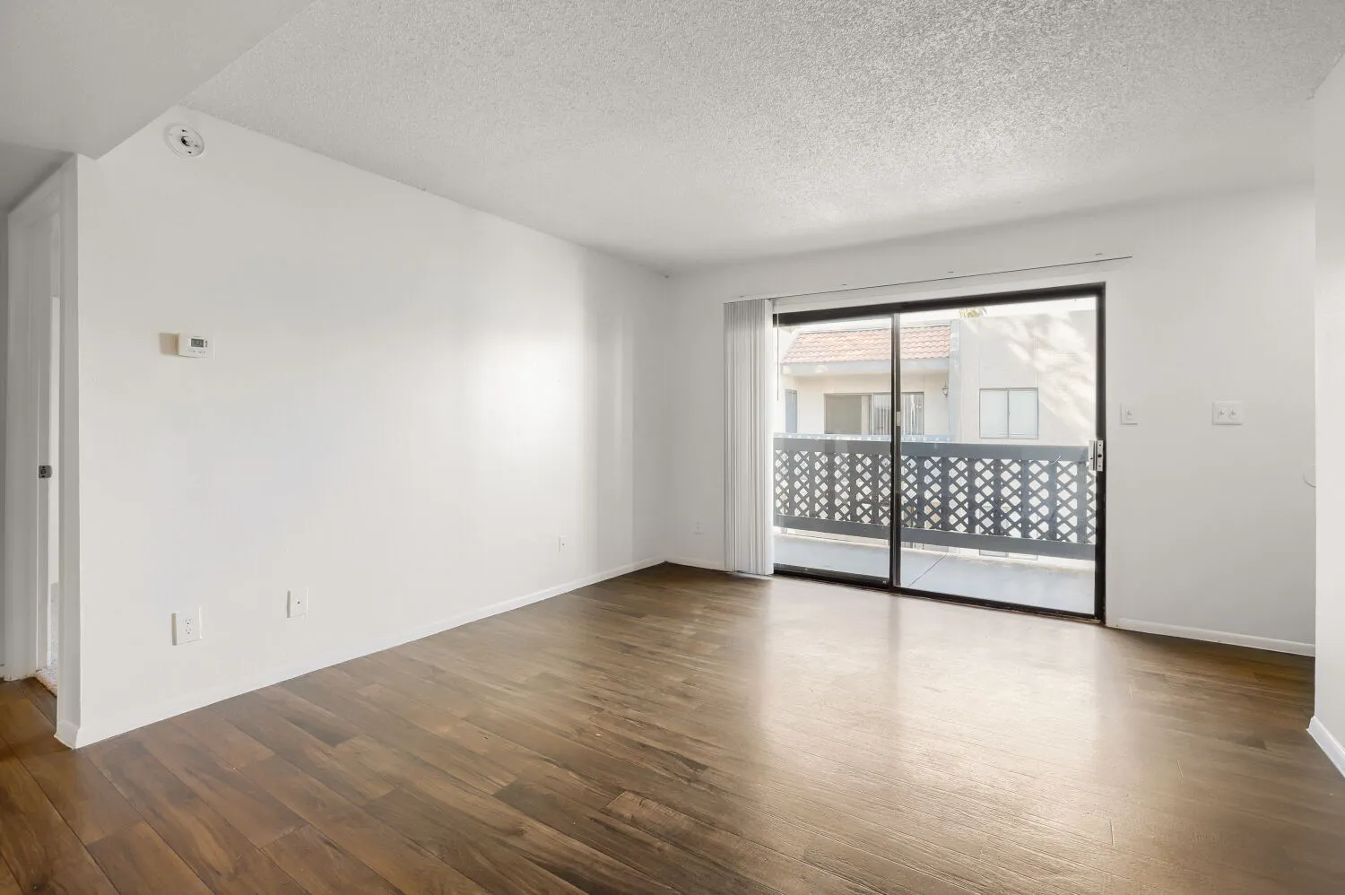 B1 Bronze floor plan living room with sliding glass door and private balcony