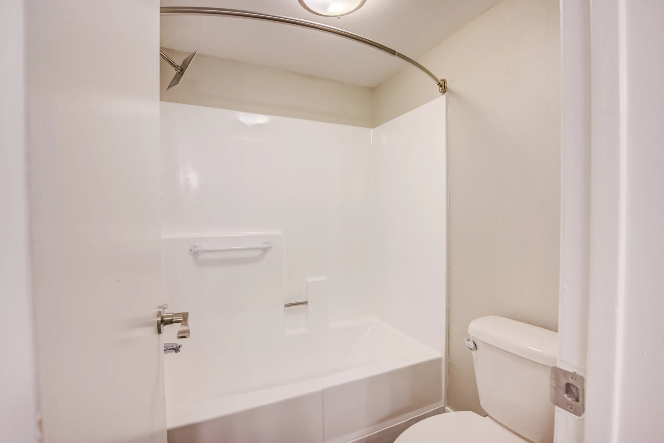 Primary bathroom with shower and tub combo