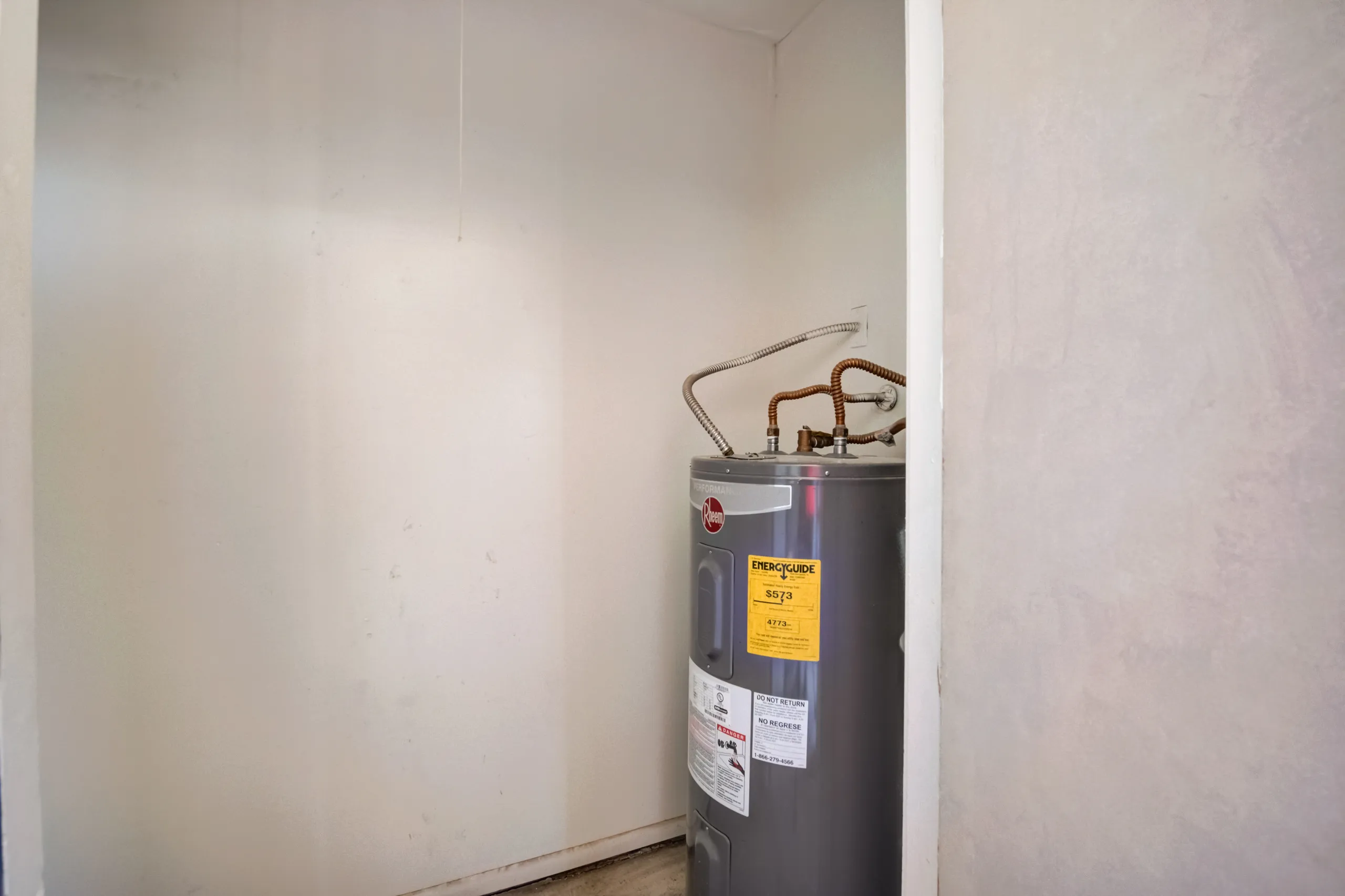 Private water heater closet on the patio