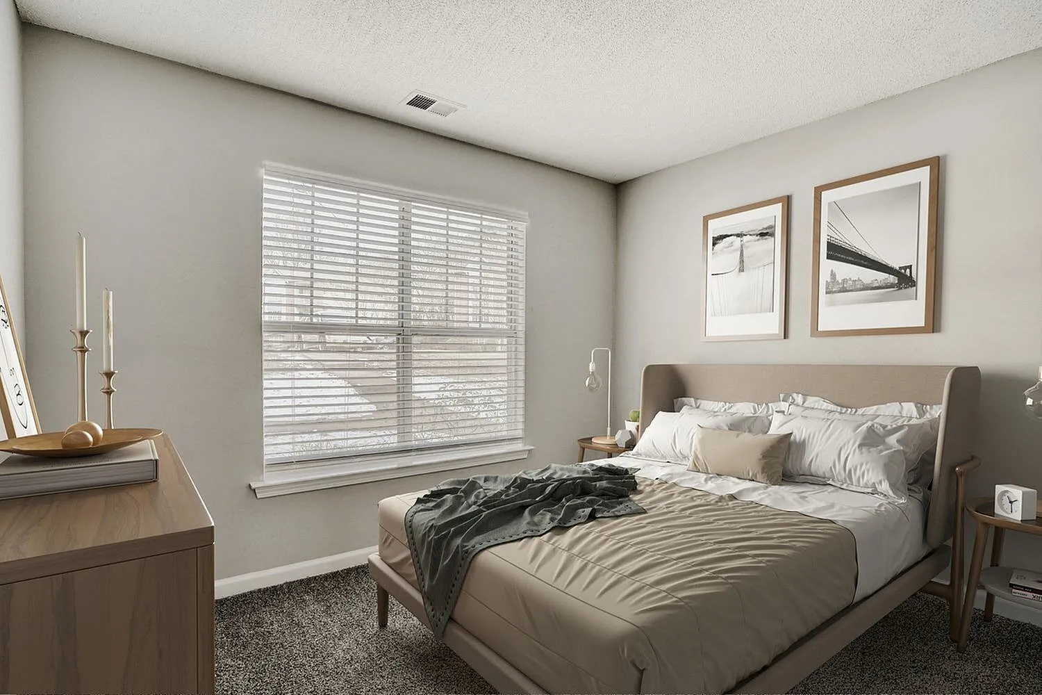 Primary bedroom, upholstered headboard, plantation shutters, carpet flooring, framed wall art
