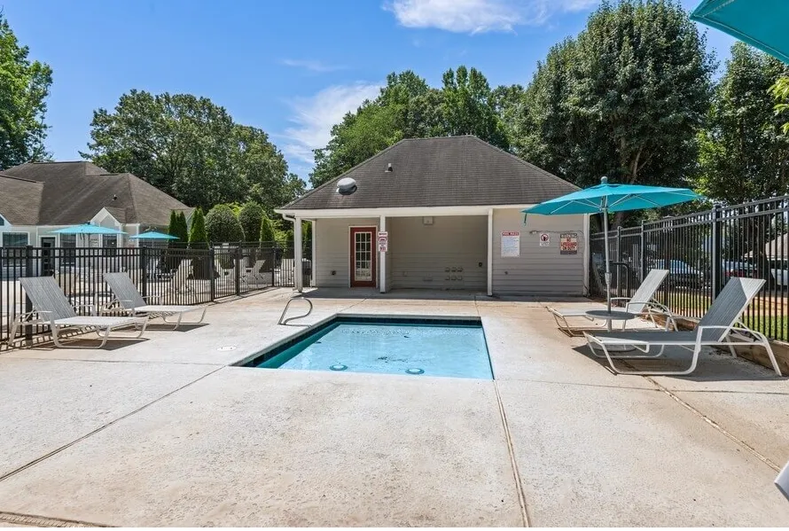 Wading pool, covered cabana, lounge chairs, umbrella seating