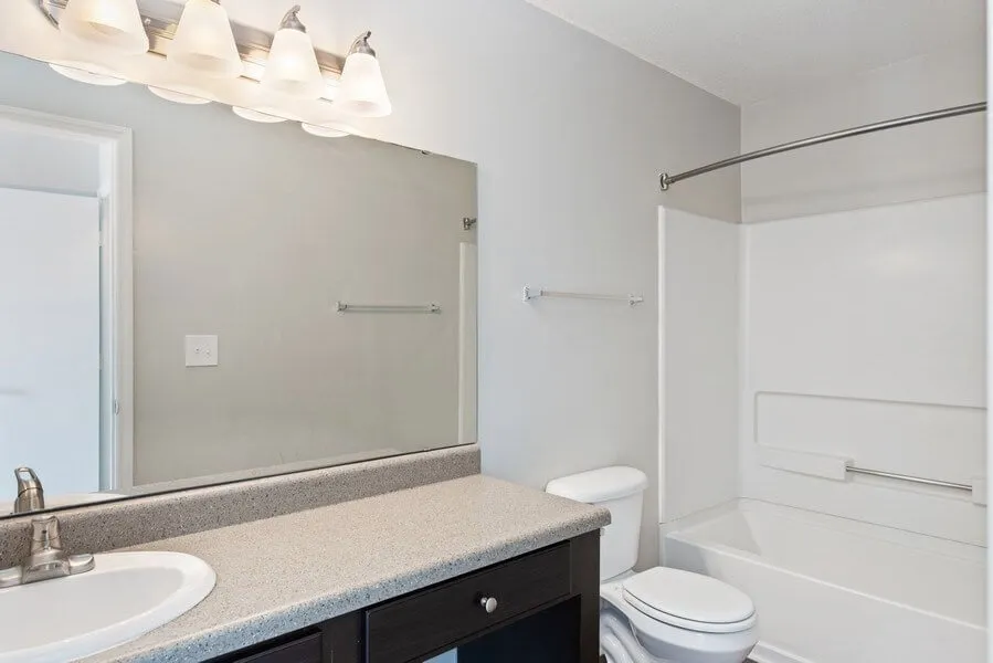 Bathroom, vanity countertop, tub/shower combo