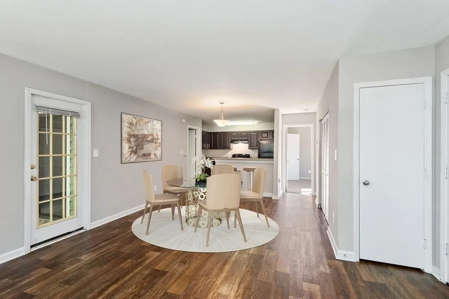 Dining area, wood-style plank flooring, pendant light fixture