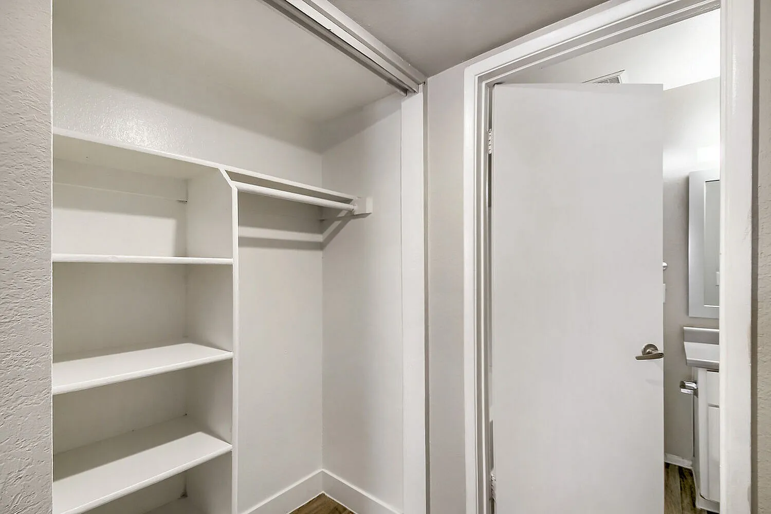 Closet with built-in shelving and hanging rod