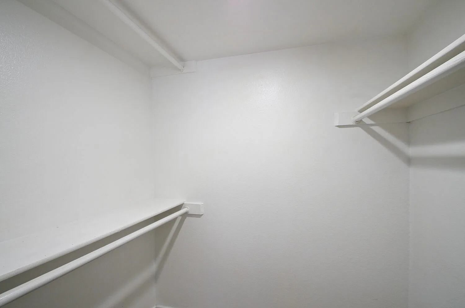 Walk-in closet with double hanging rods