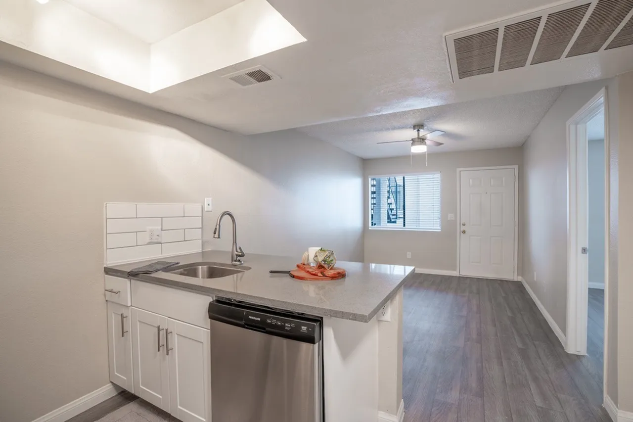 Kitchen island overlooking living space and front door