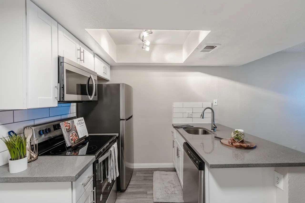Dishwasher, double sink, and refrigerator
