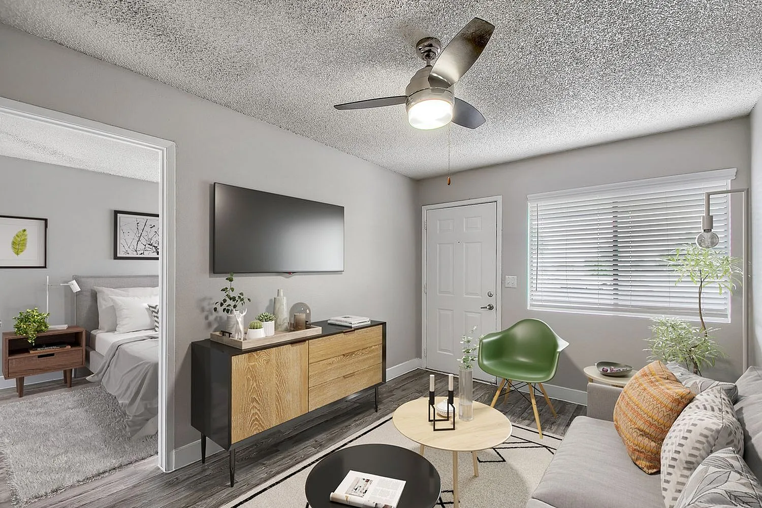 A1 Gold living room with ceiling fan and front entry