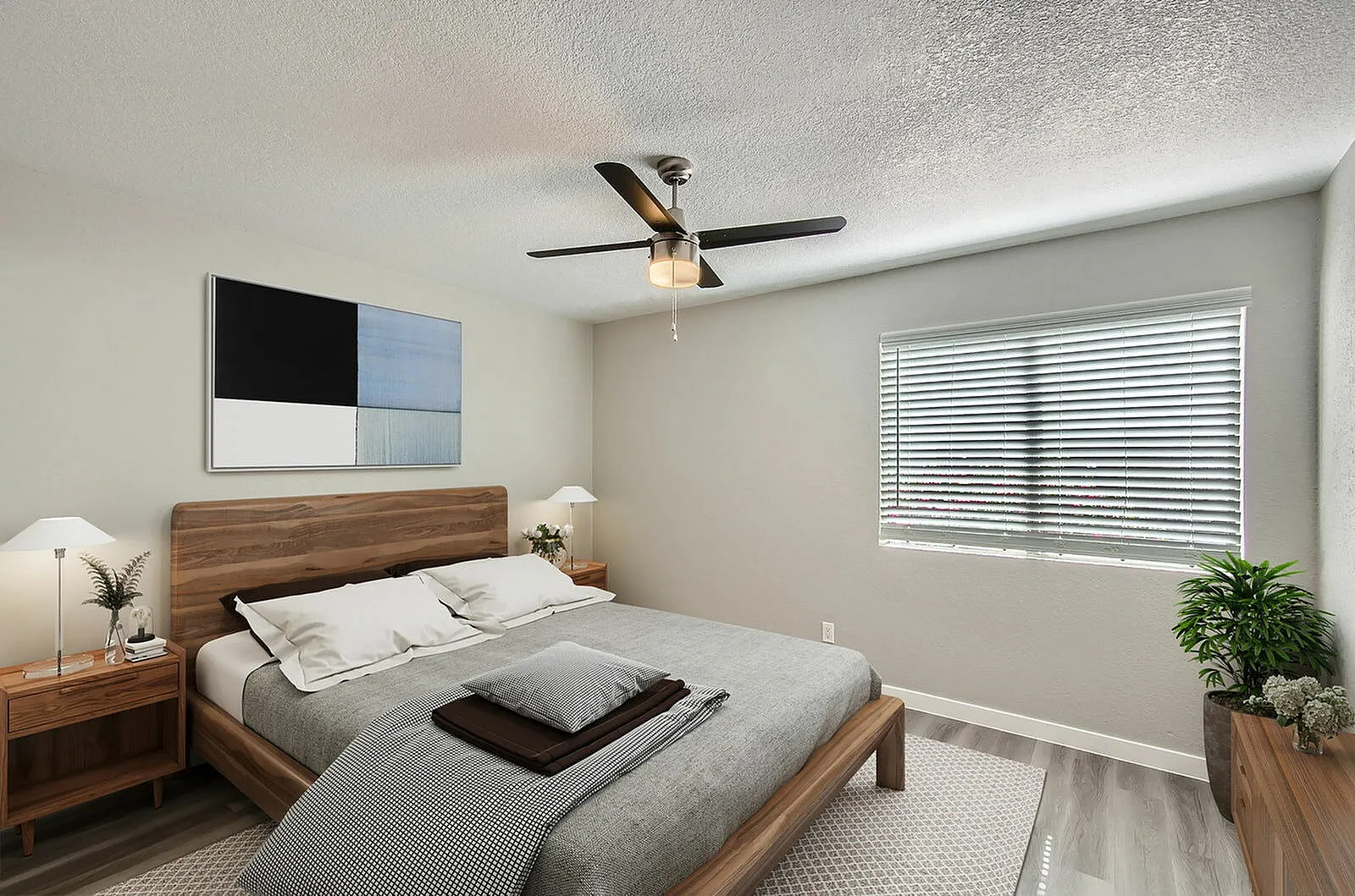 Primary bedroom, wood-style bed frame, ceiling fan, wood nightstands, blinds