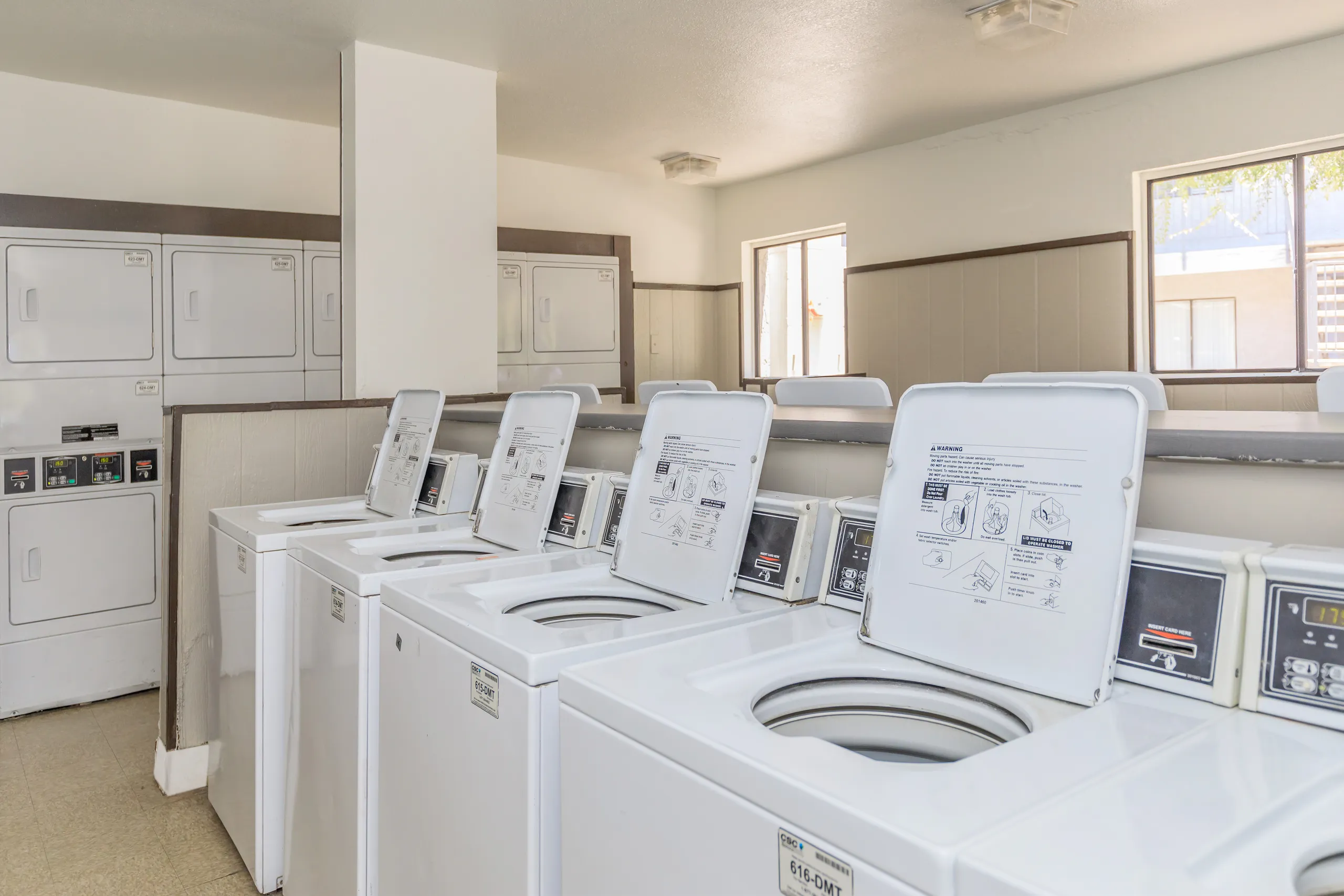 Coin-operated laundry room with washers and dryers