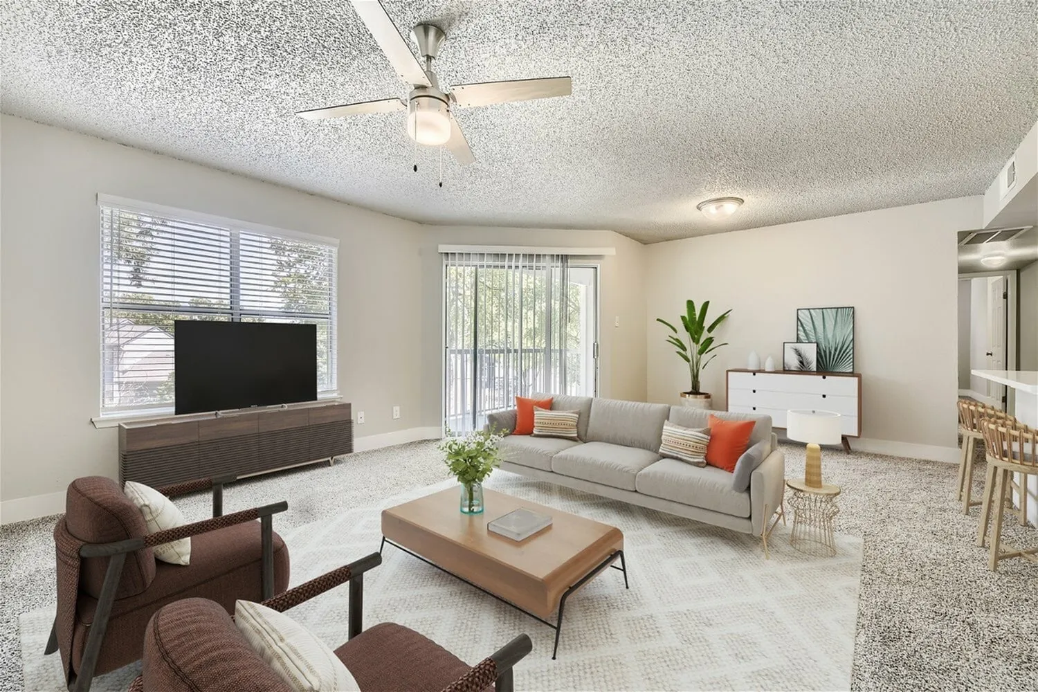 B1 Gold living room, ceiling fan, sliding glass door, window with blinds, carpet flooring