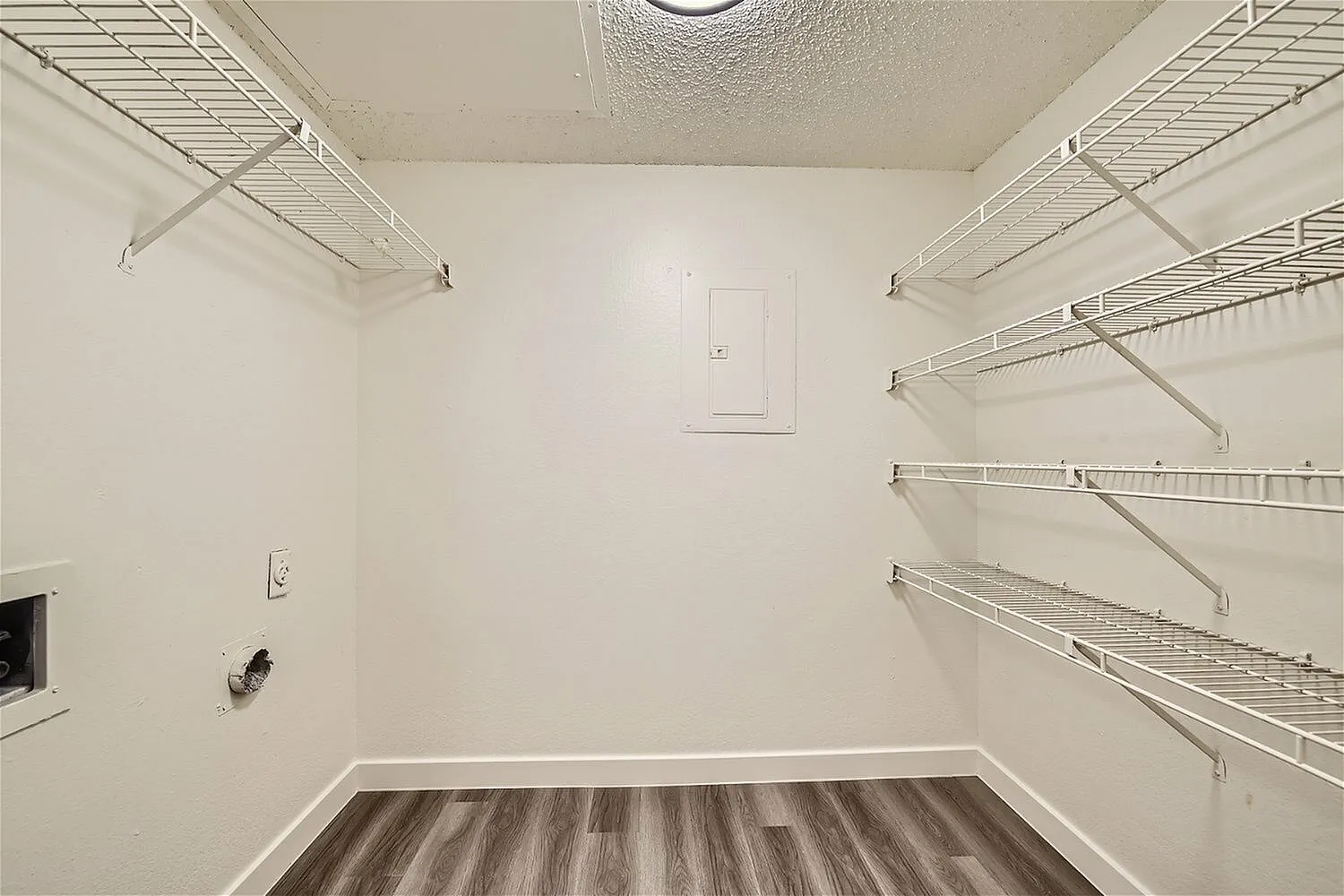 Walk-in closet, wire shelving, hanging rods