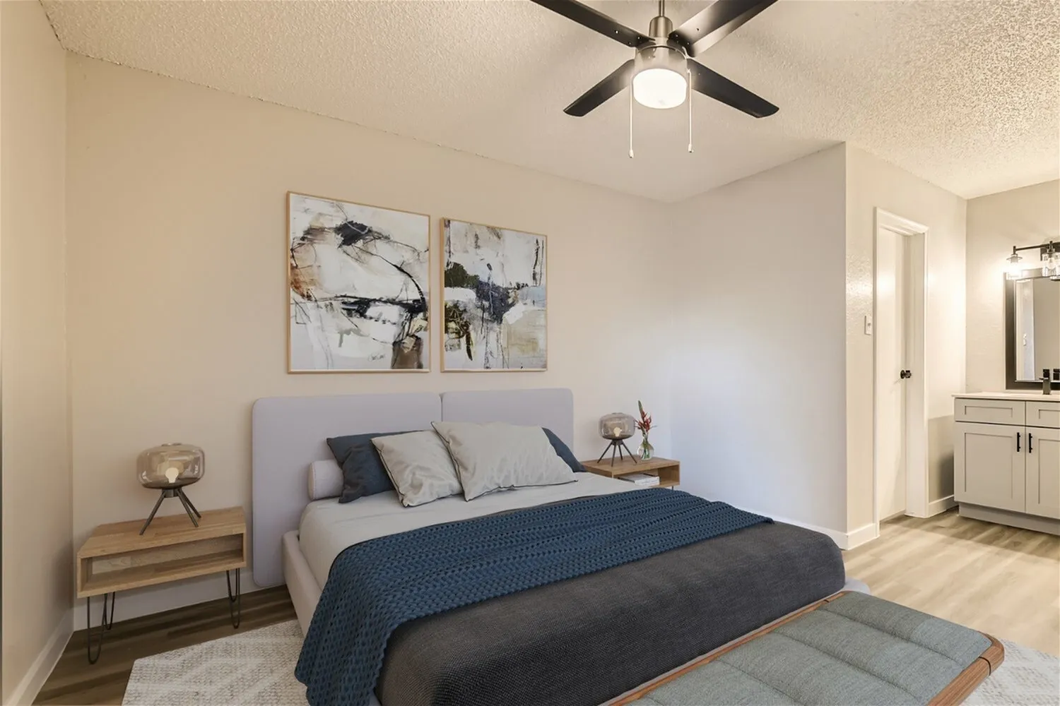 Bedroom, ceiling fan, textured walls, natural light