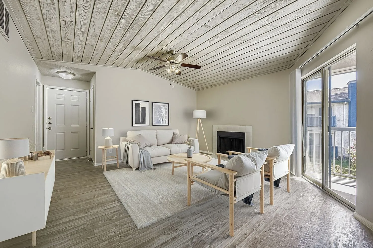 Living room, fireplace, plank ceiling, ceiling fan, wood-style plank flooring