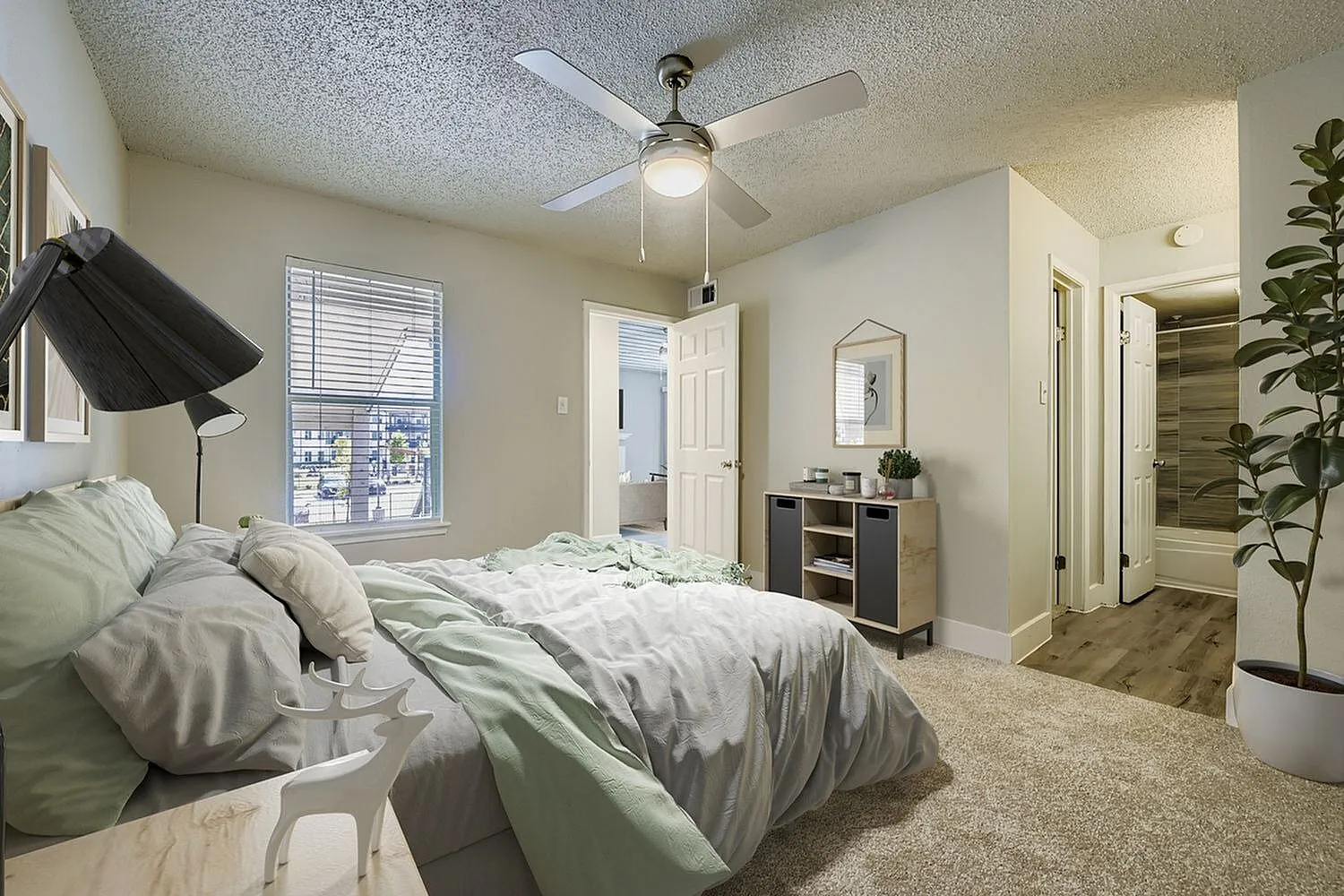 Bedroom, ceiling fan, window with blinds, carpet flooring