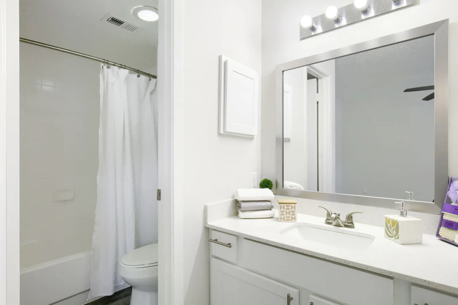 Bathroom vanity with tub and shower combo