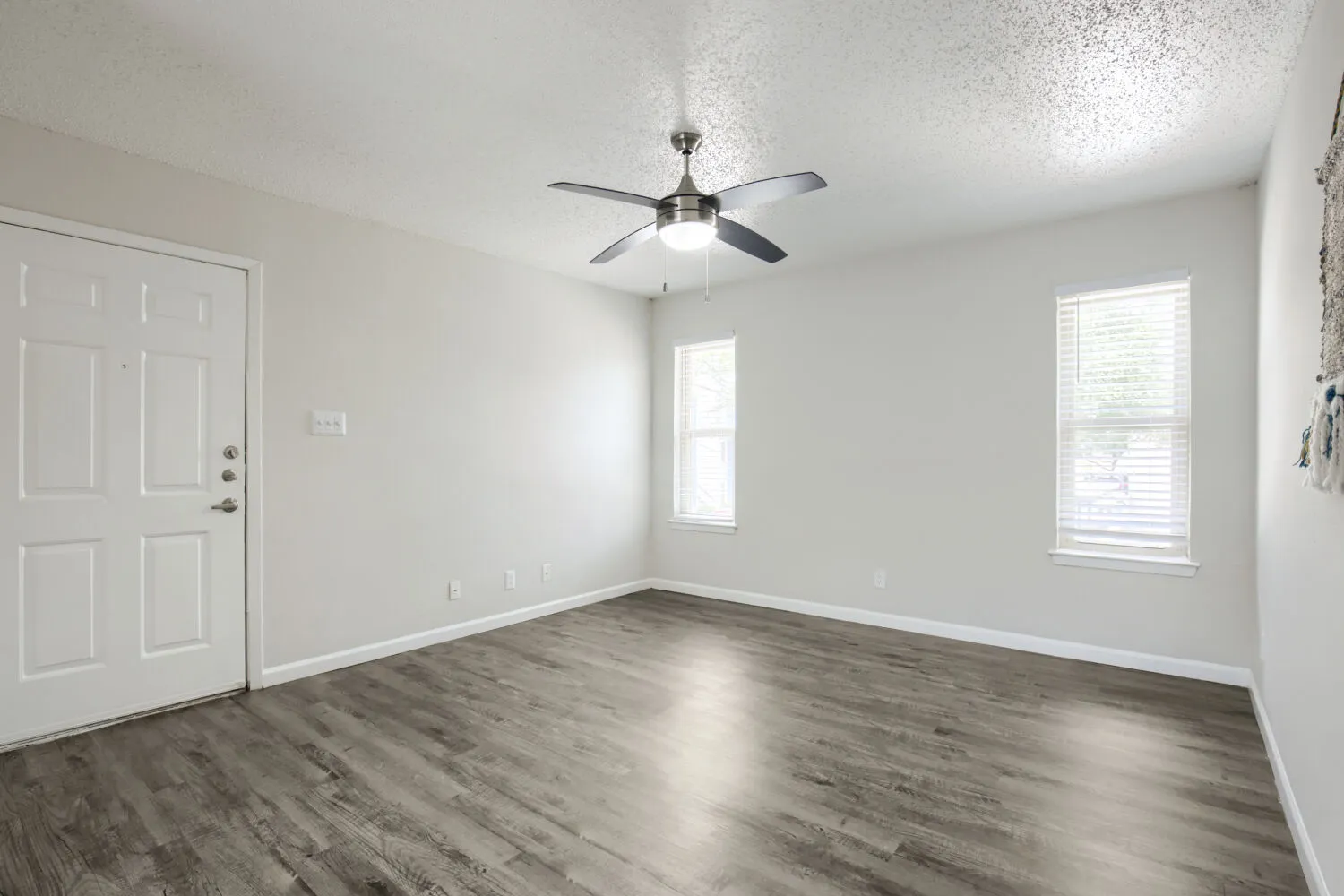 B2 Silver floor plan living room with wood-style plank flooring and dual windows