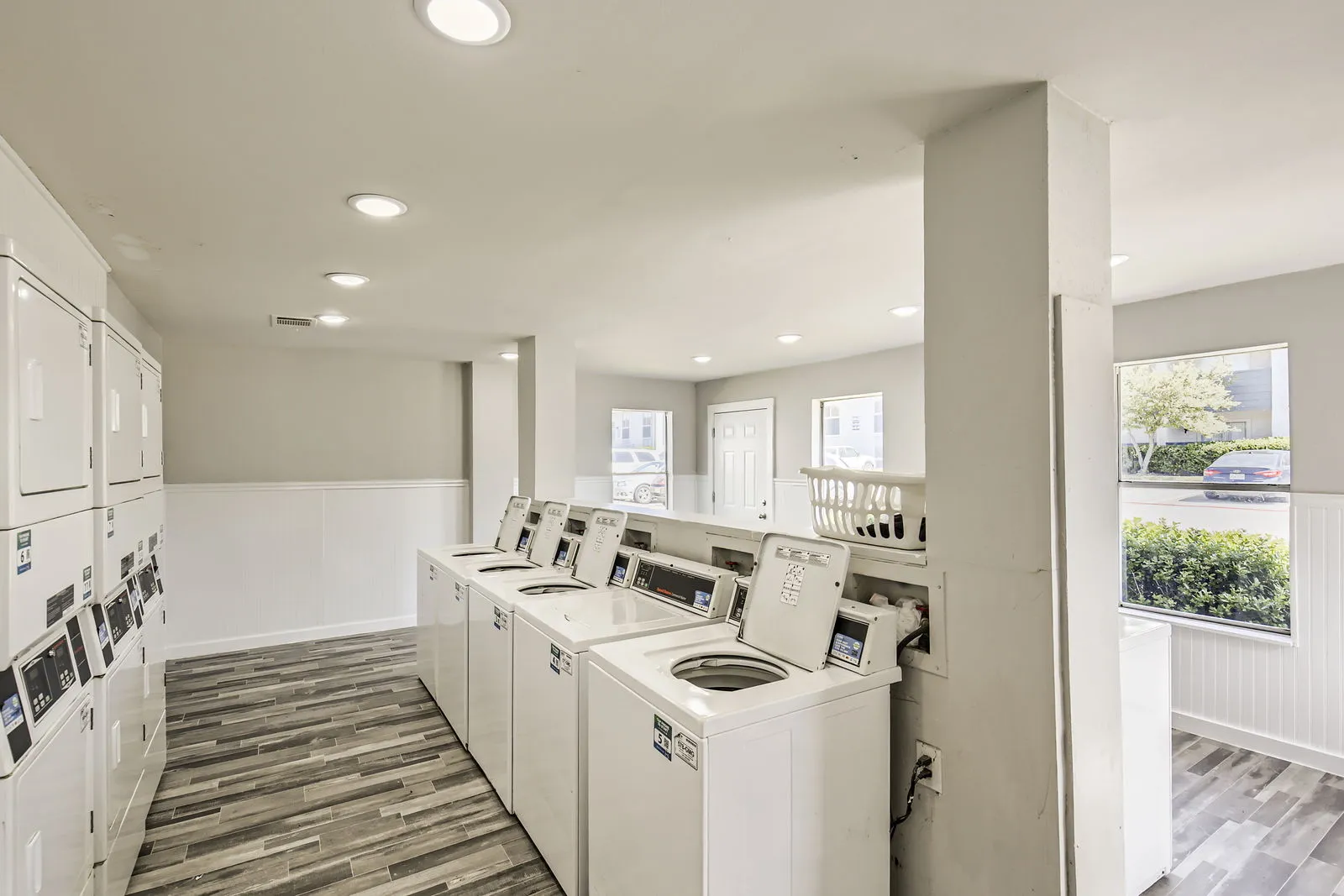 Community laundry room, washers and dryers, natural light