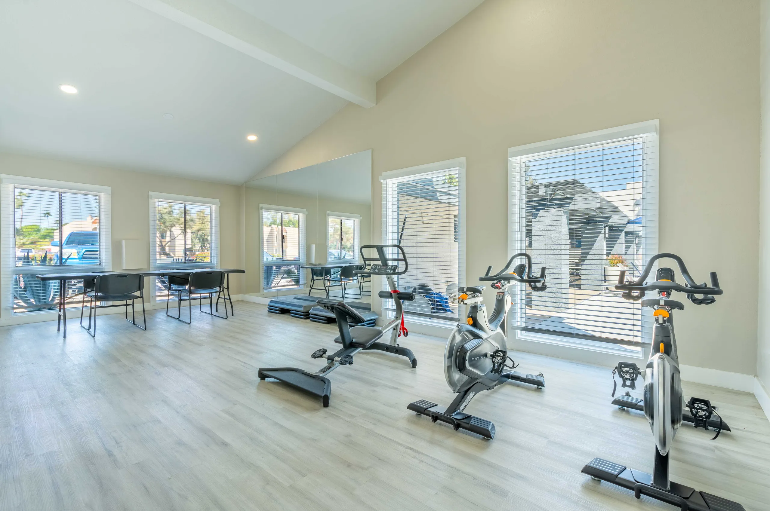 Multipurpose room, spin bikes, stretching mats, large windows