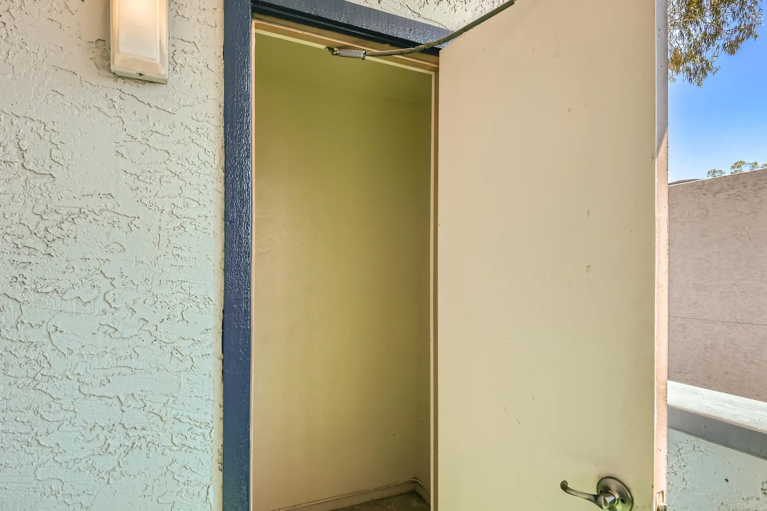 Exterior storage closet, private patio access