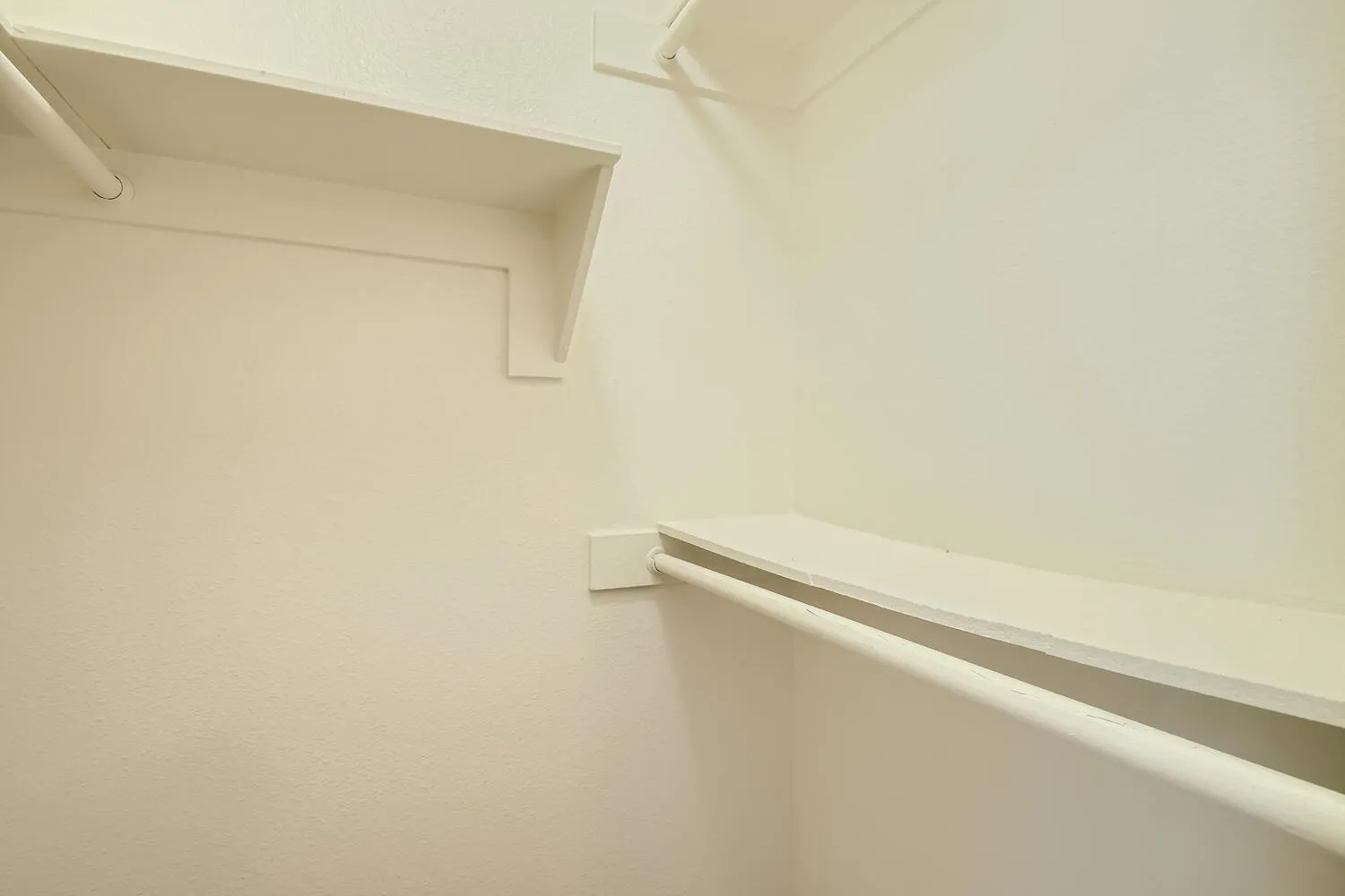 Walk-in closet, built-in shelving, corner storage