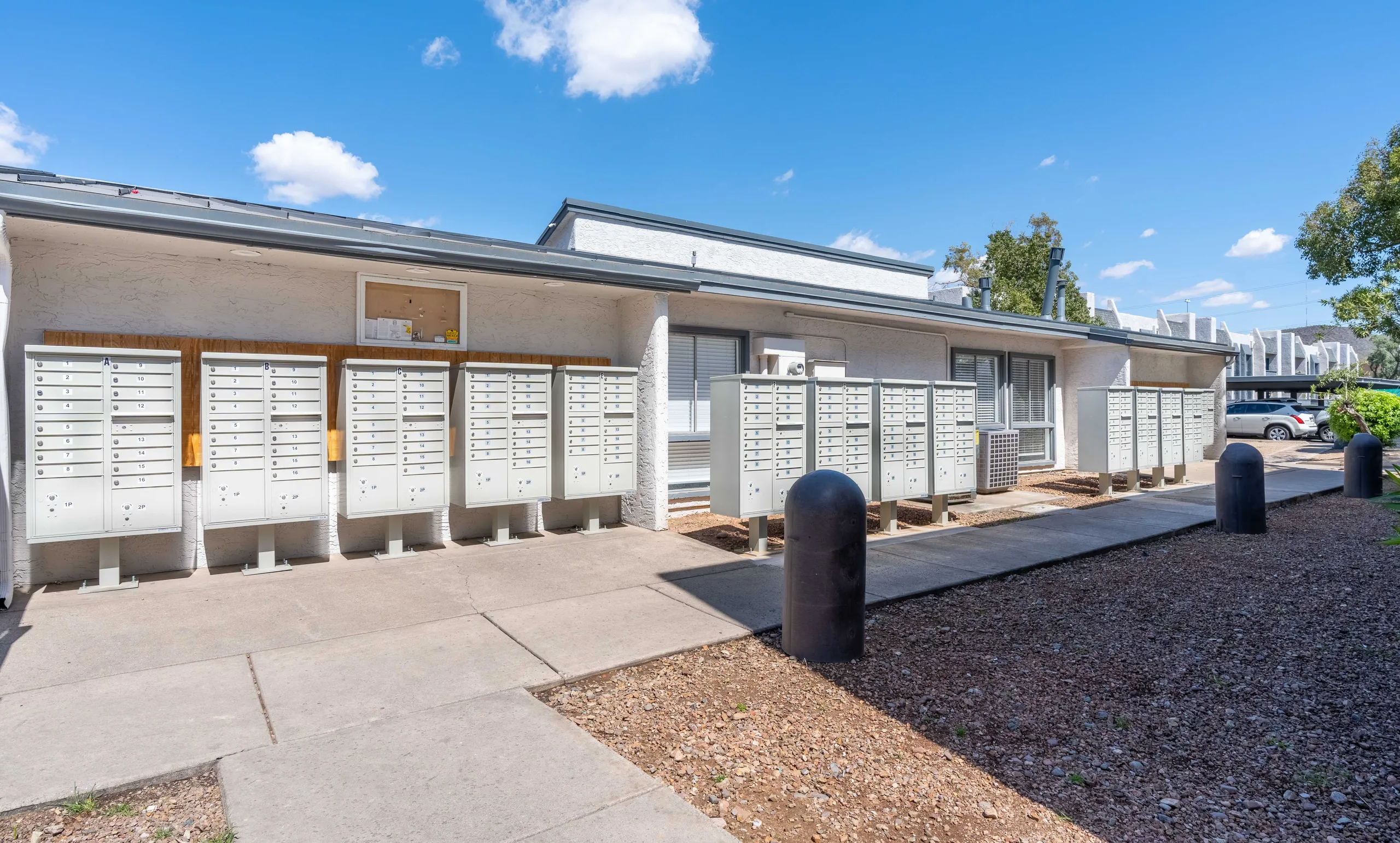 Mail area, package lockers, covered walkway