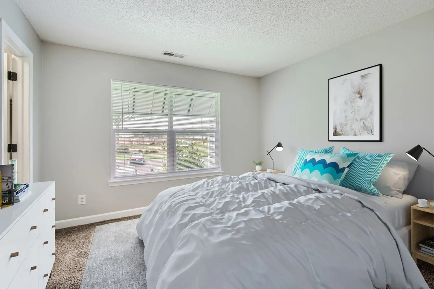 Bedroom with wood-style plank flooring, window with natural light