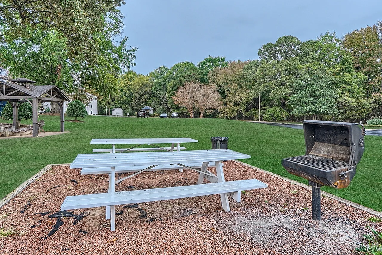 Picnic tables on the community lawn