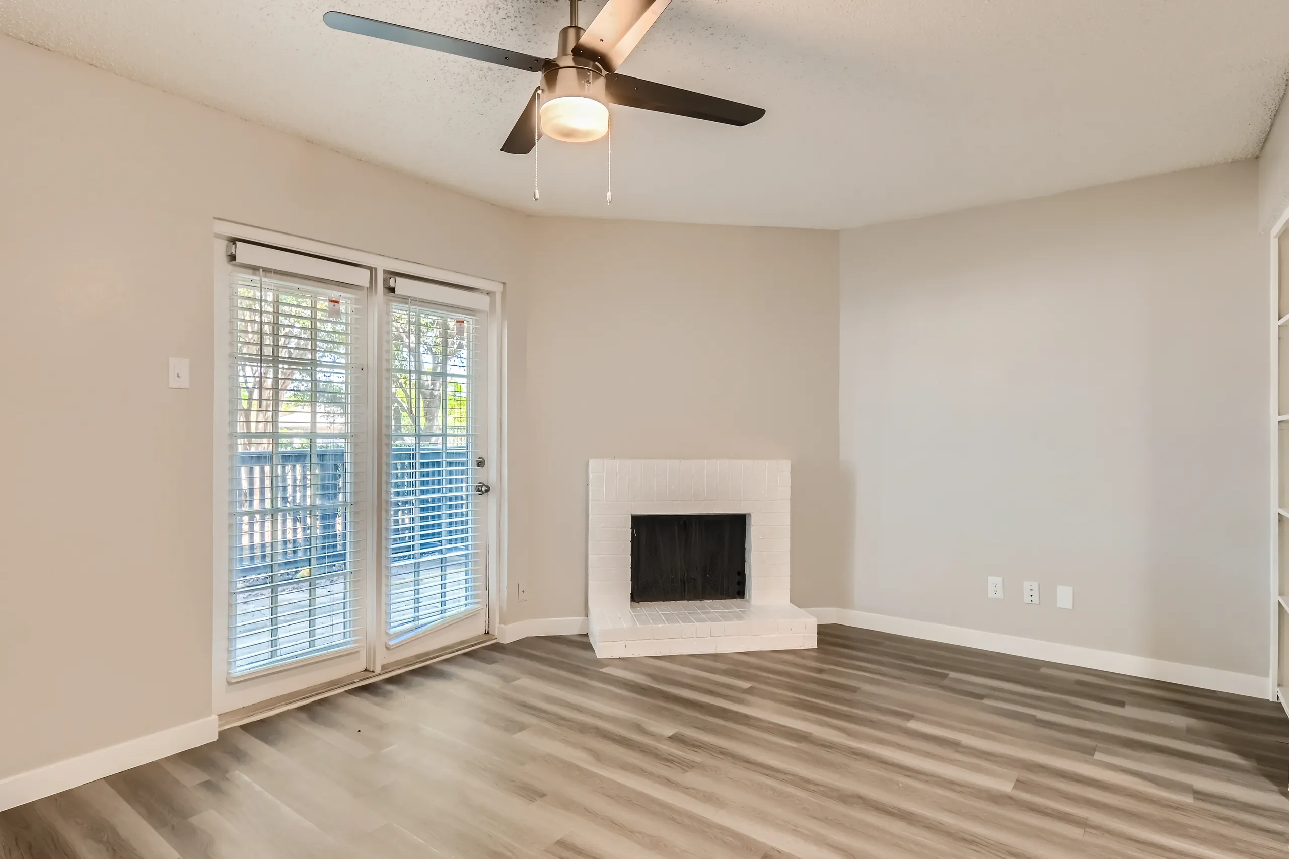 B3 Platinum floor plan living room with painted brick fireplace