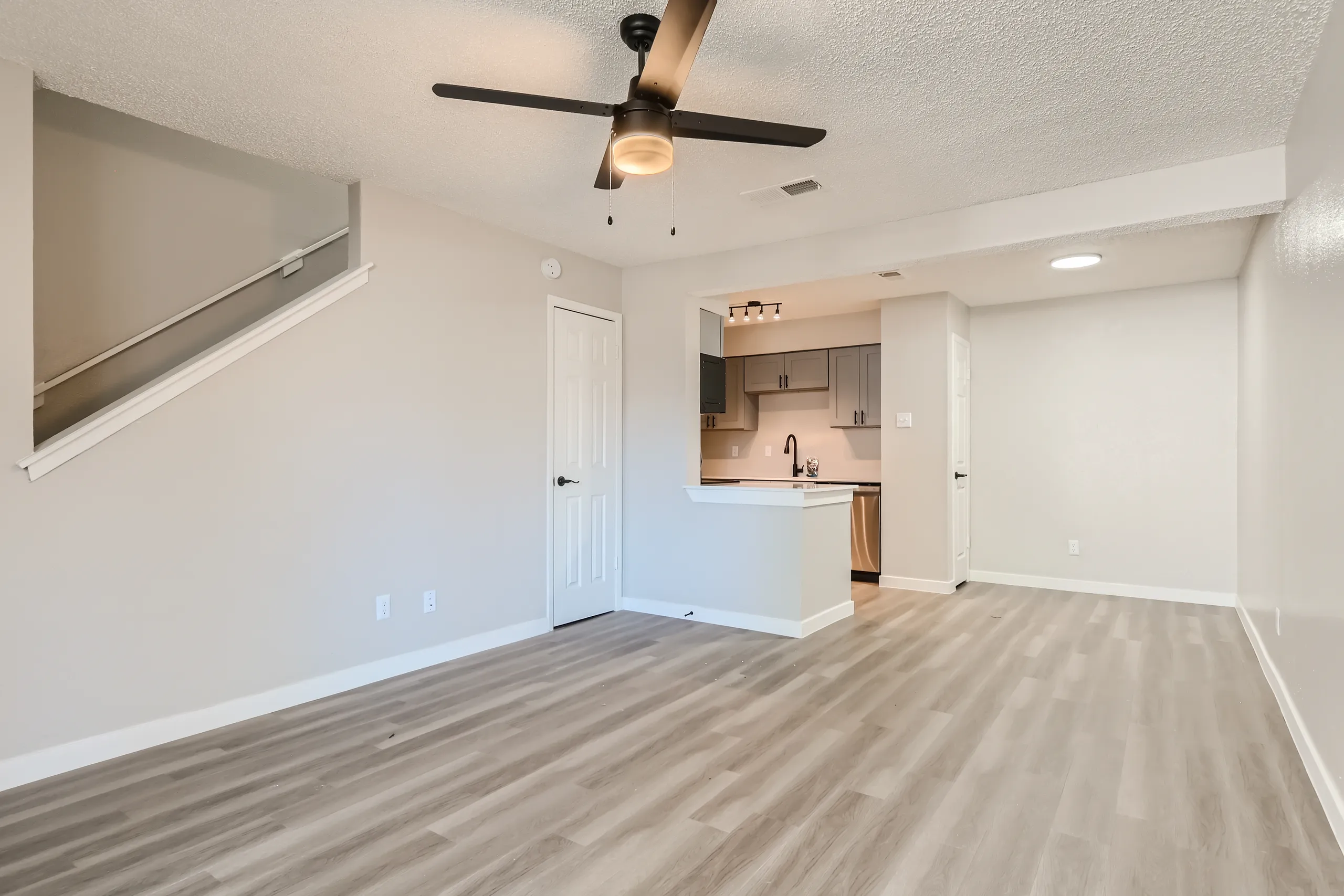 A2 Platinum floor plan living room with staircase and open kitchen view