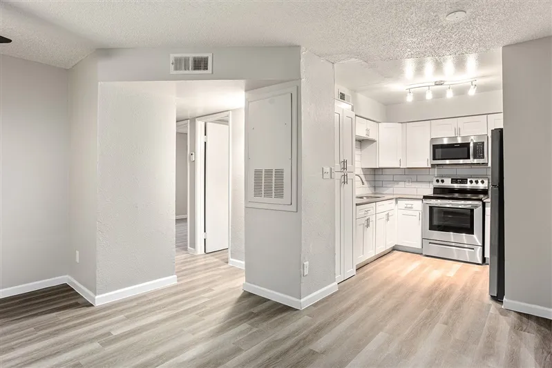 Open floor plan connecting living room and kitchen
