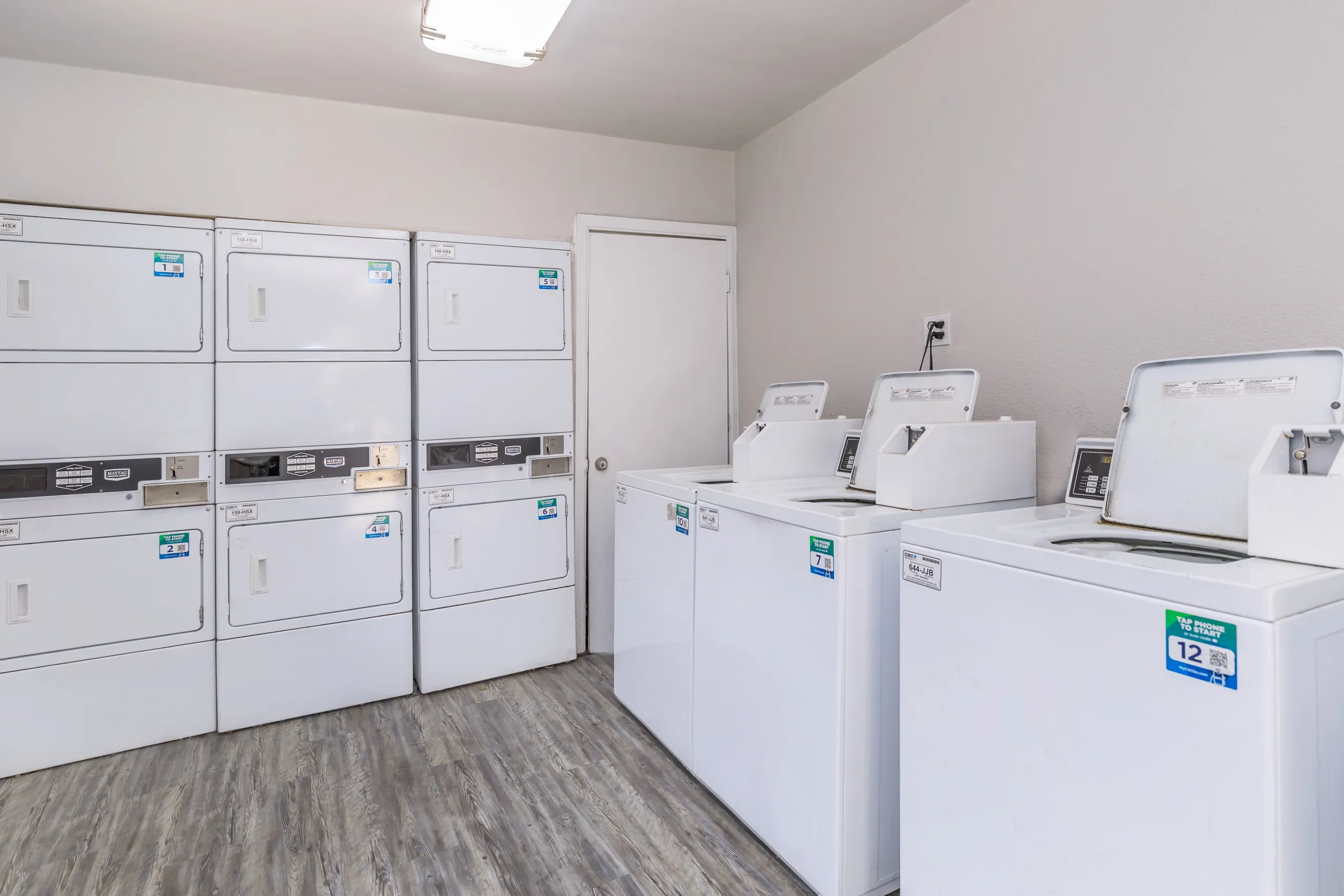 On-site laundry room with washers and dryers