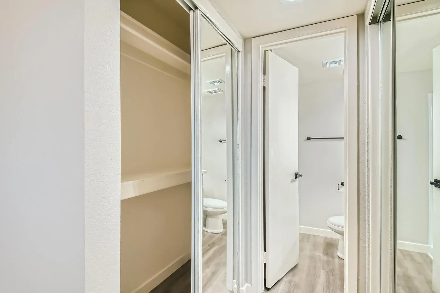 Primary closet with built-in shelving