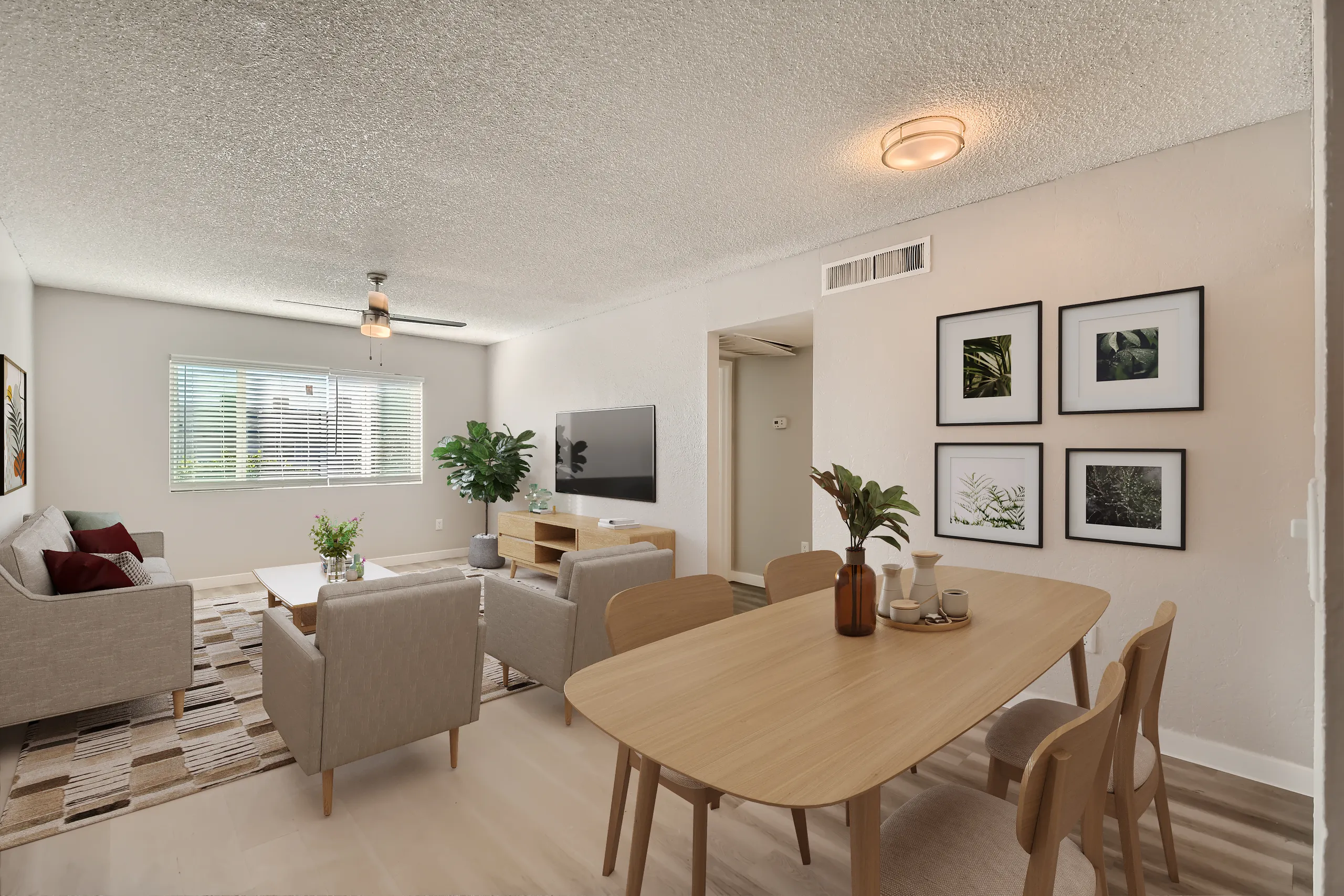B1 Platinum living and dining area, ceiling fan, wood-style plank flooring