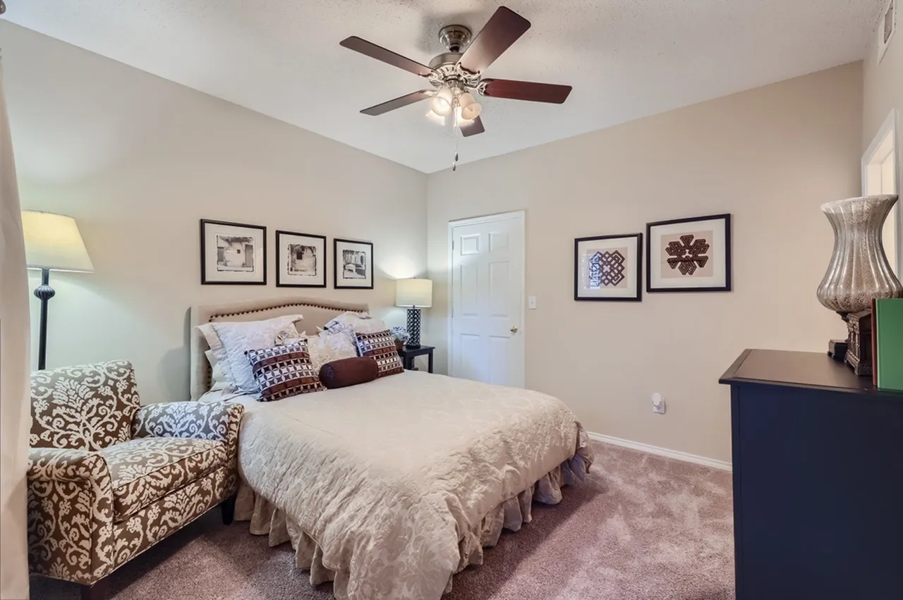 Bedroom, ceiling fan, window with blinds