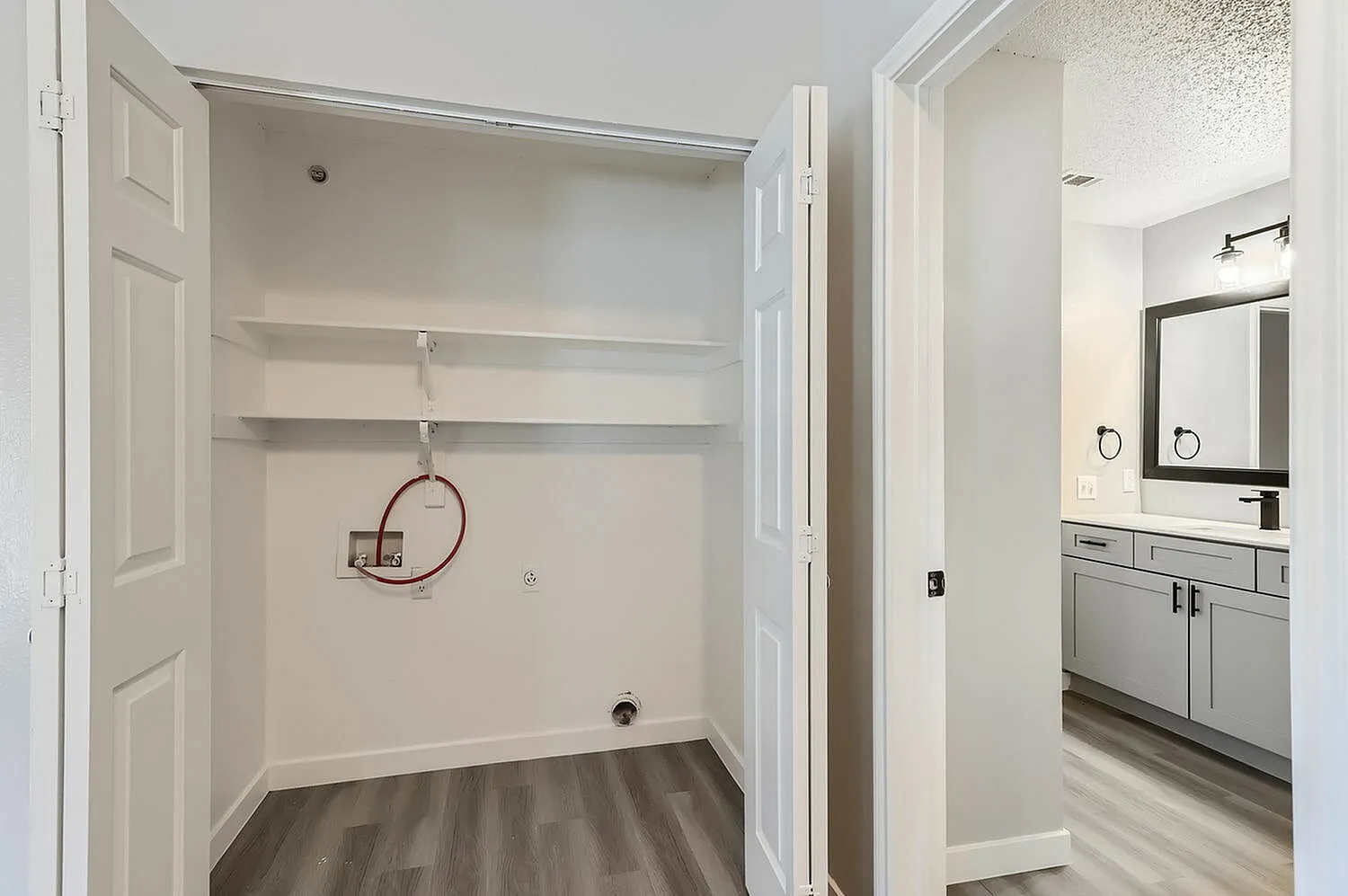 Closet, shelving, wood-style plank flooring