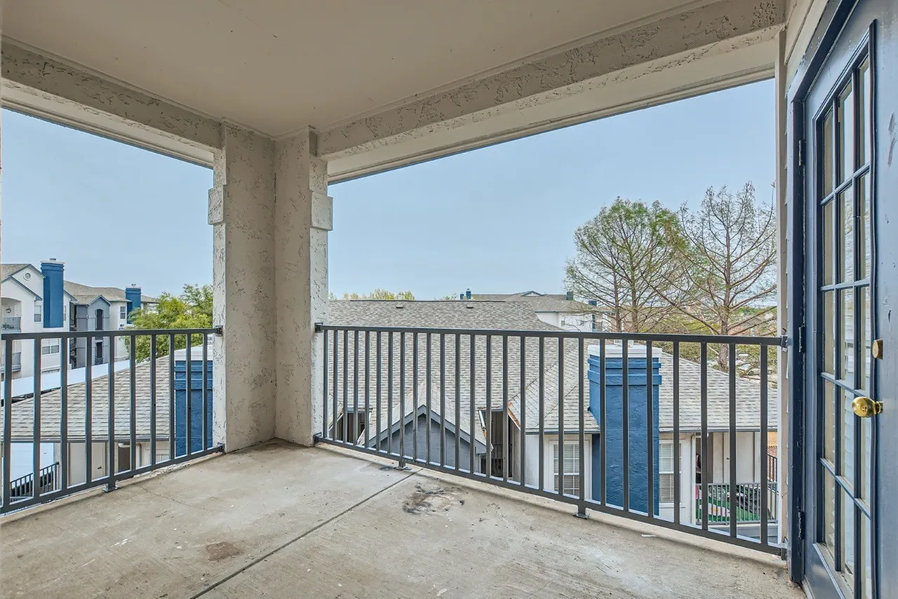 Balcony, metal railing, building views