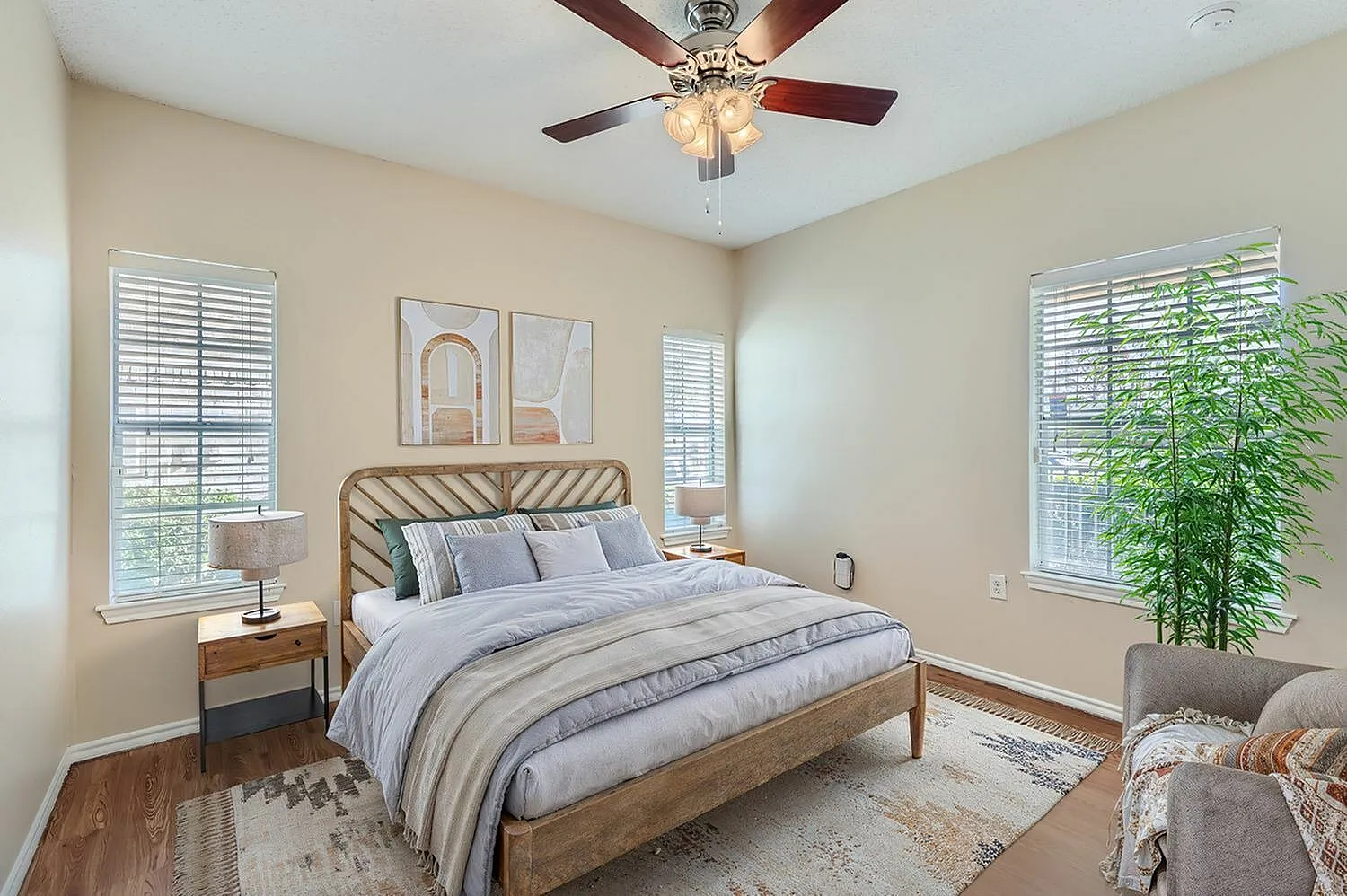 Bedroom, window with blinds, wood-style plank flooring