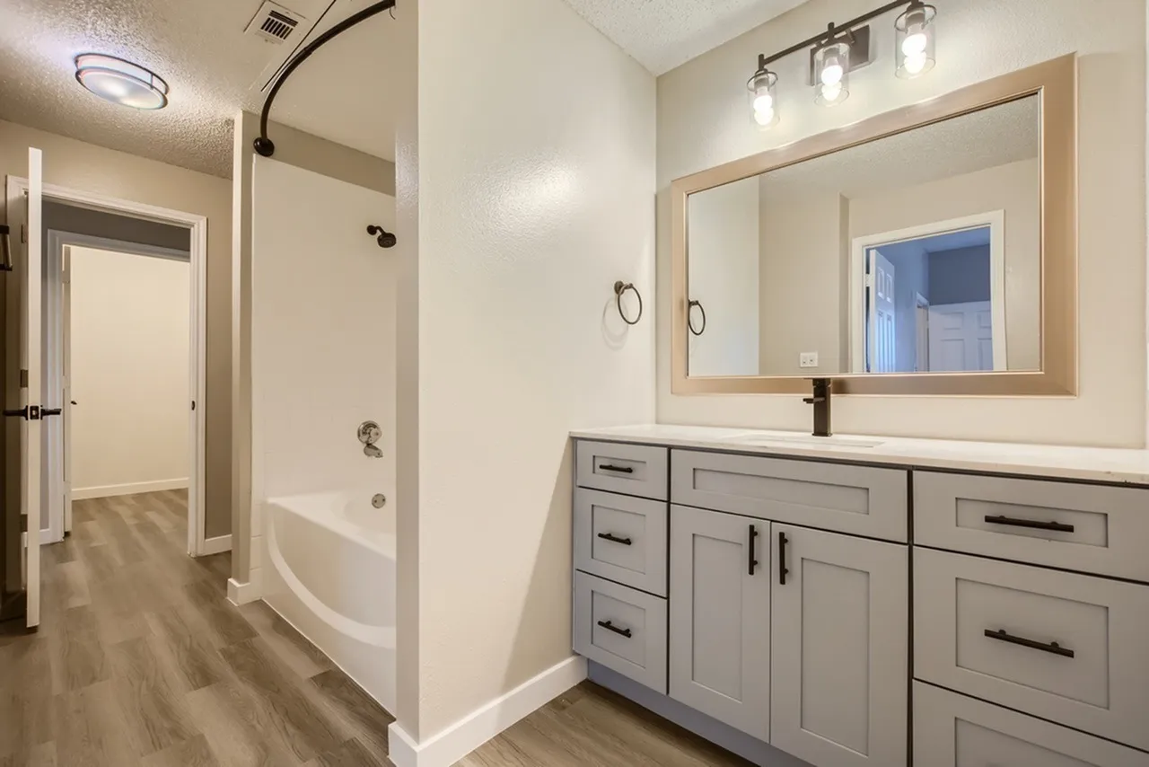 Tub shower combo, framed mirror