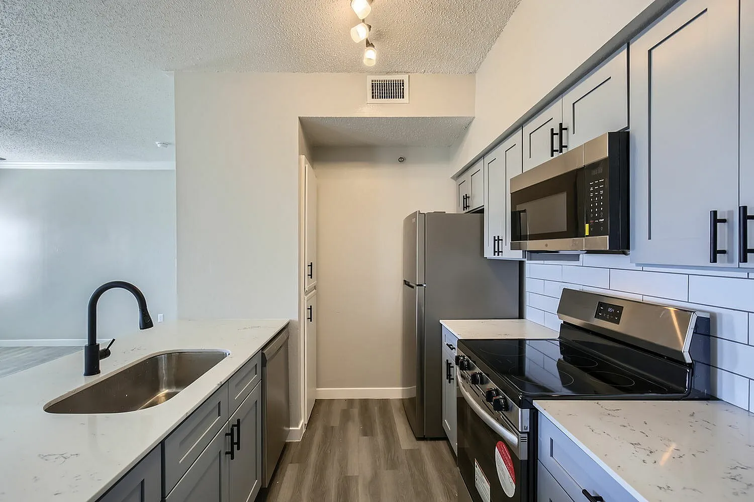 Kitchen, stainless steel appliances, subway tile backsplash