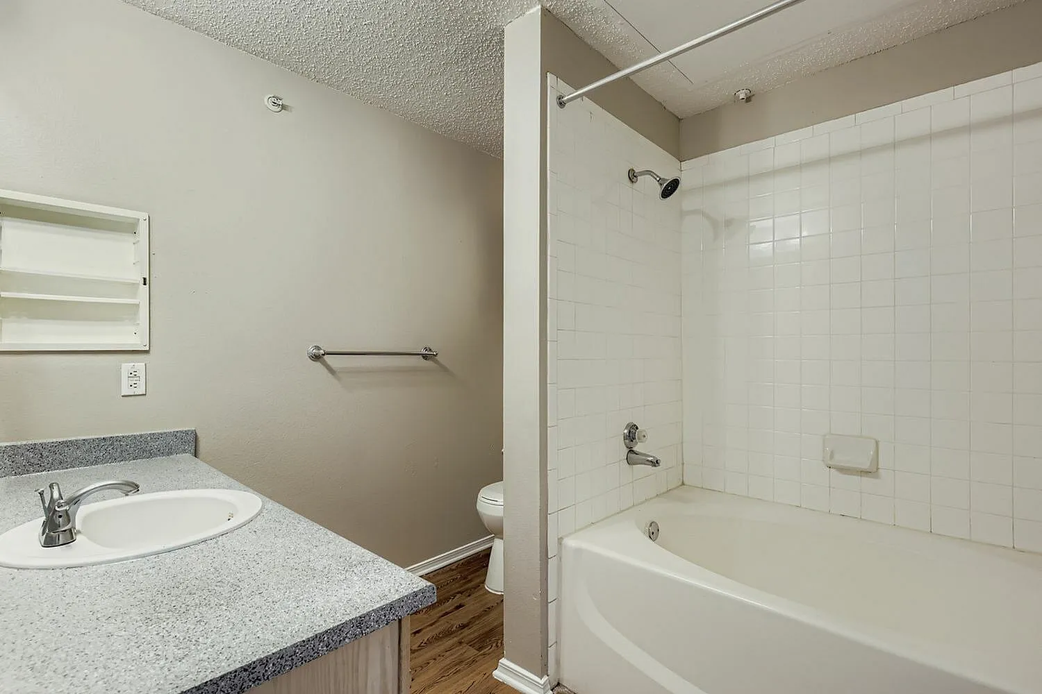 Tub shower, tile surround, towel bar