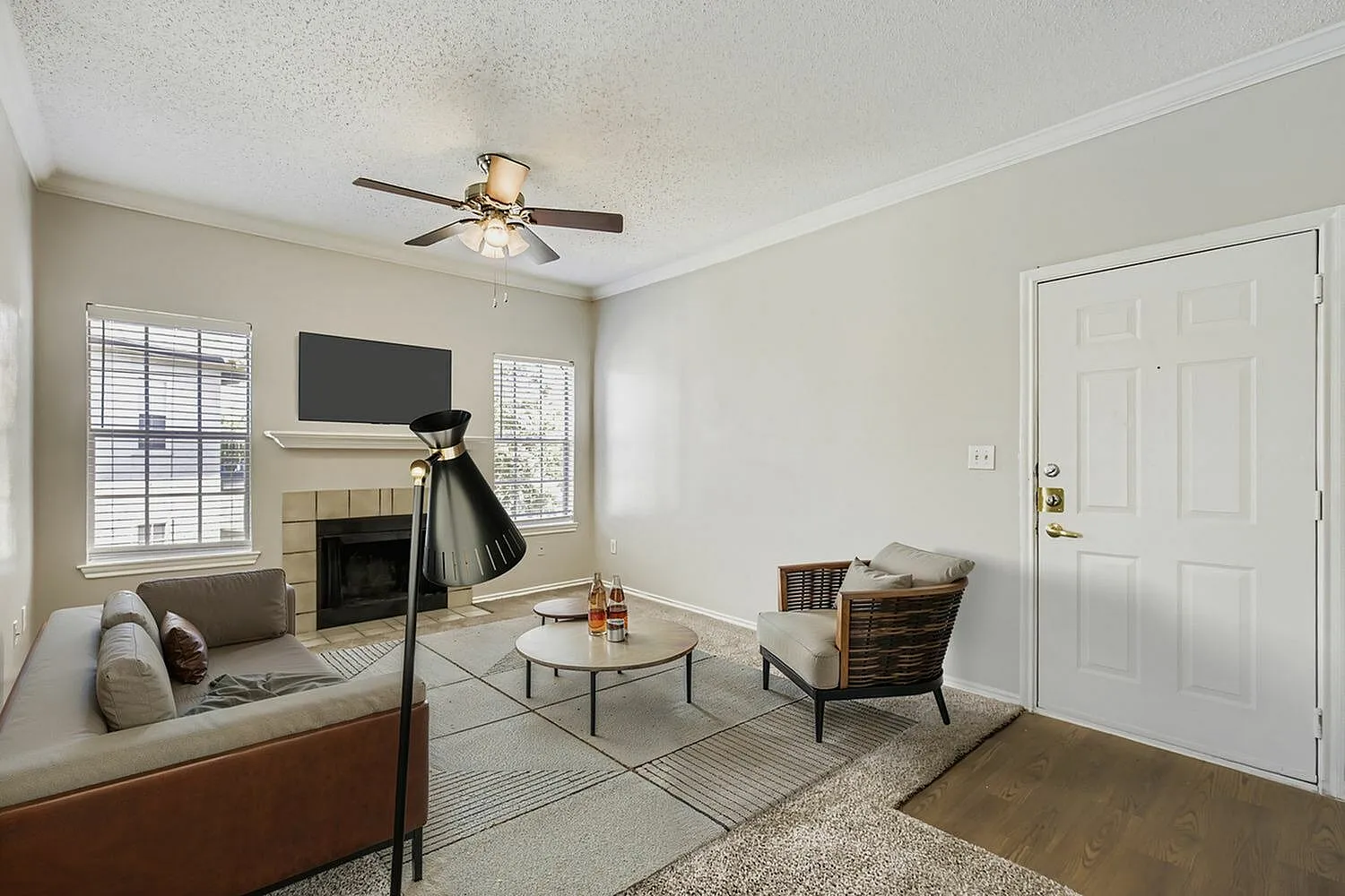 Living room, fireplace, window with natural light