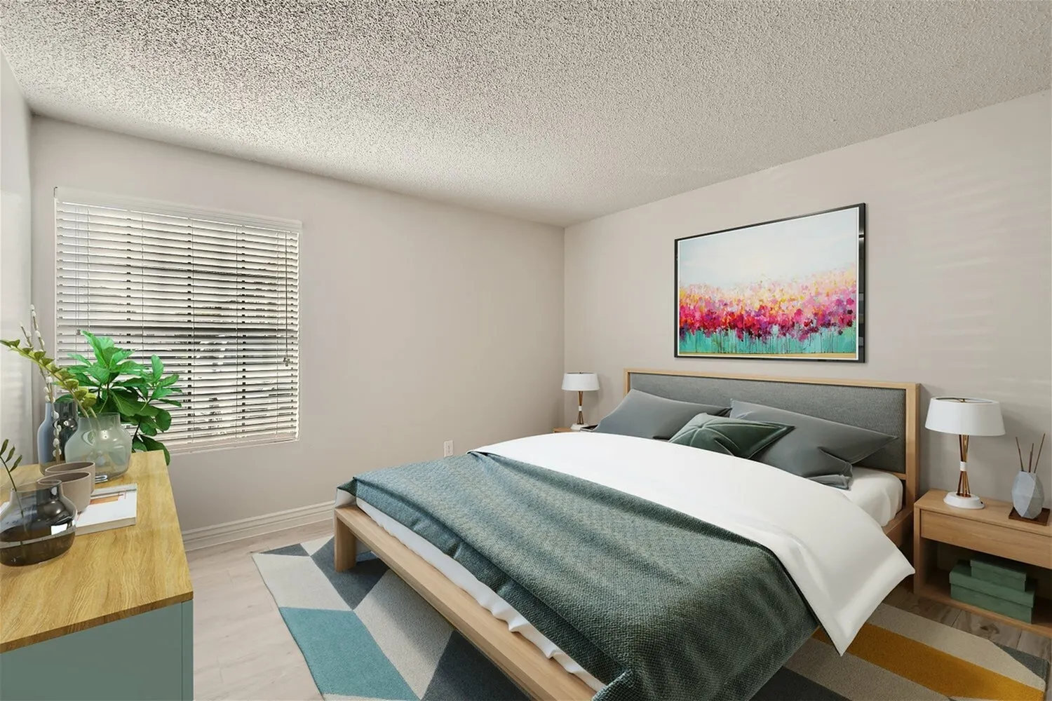 Primary bedroom, wood-style plank flooring, gray upholstered headboard, pendant nightstands, framed floral artwork