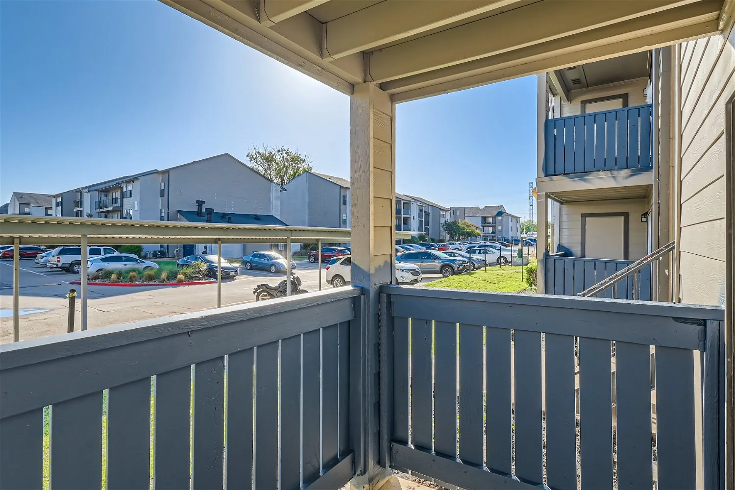 Private balcony, community parking and grounds view